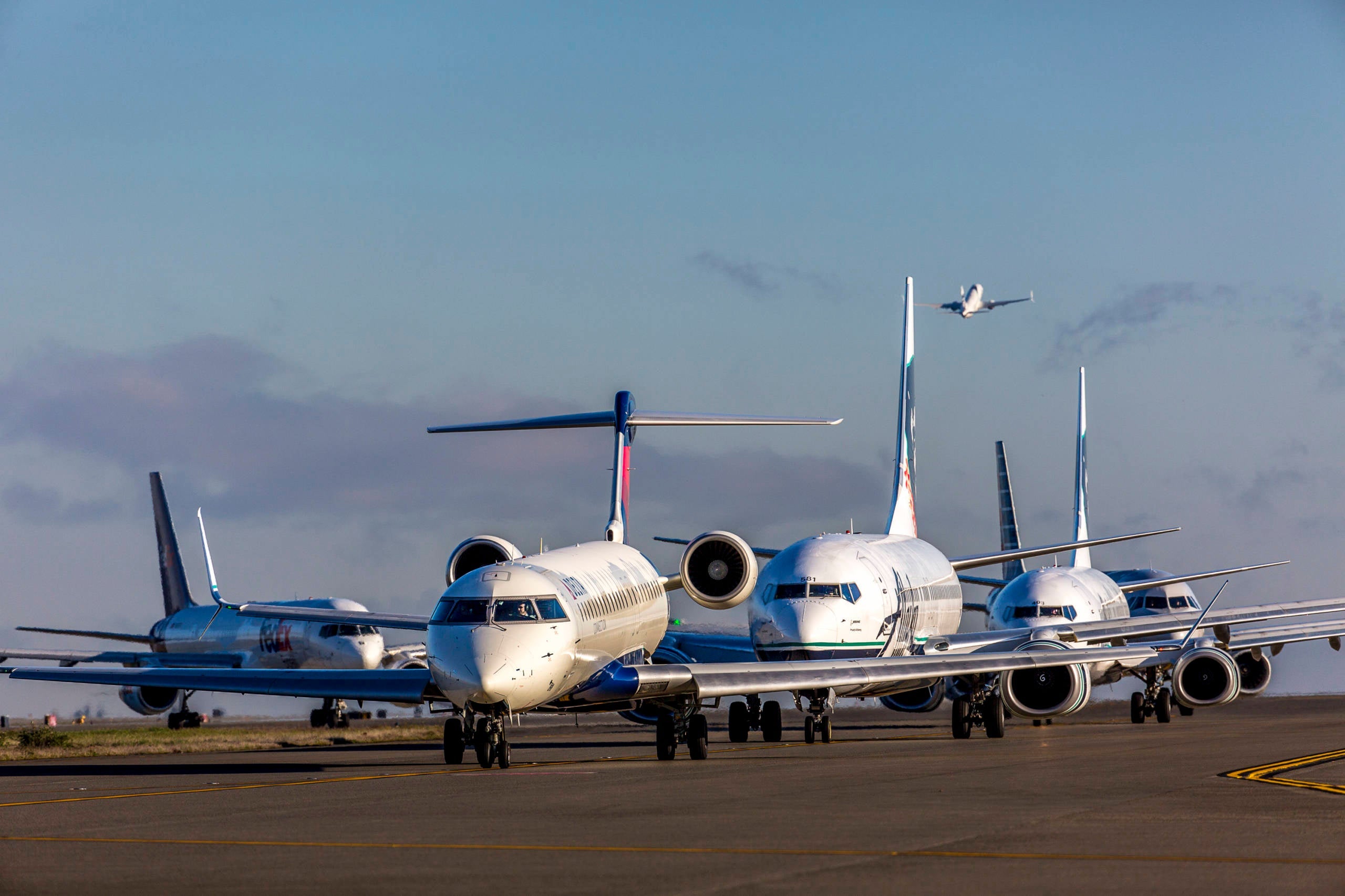 Delta, Alaska and American jets on a taxiway at Seattle/Tacoma International Airport. (Image courtesy of the Port of Seattle)