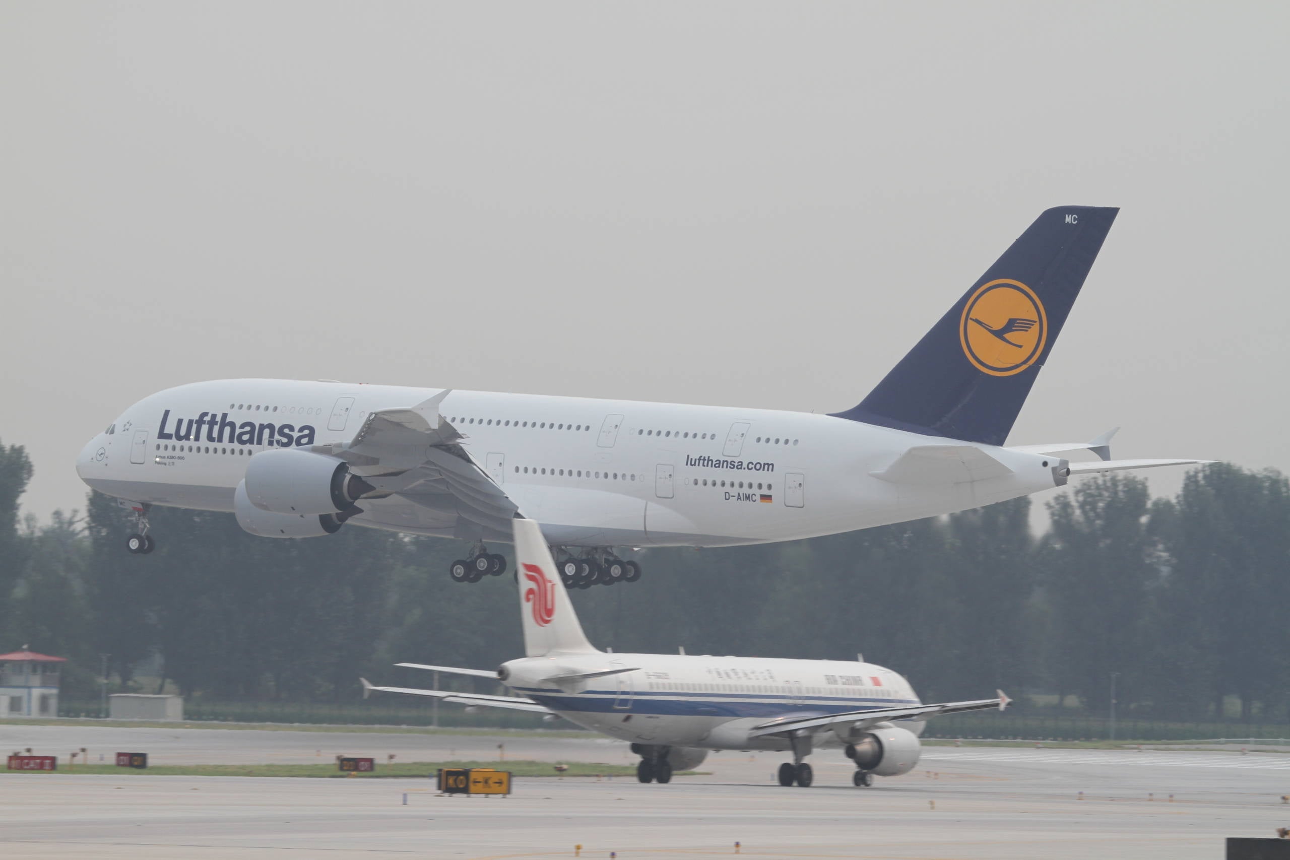 BEIJING - SEPTEMBER 02: (CHINA OUT) Lufthansa's third Airbus A380 which bears the name Peking, arrives at Capital International Airport on September 2, 2010 in Beijing, China. The Lufthansa Airbus A380 is the first European airline to operate regular flights from Frankfurt to Beijing. Tokyo and Beijing are the first destinations to have scheduled routes with Johannesburg being the third destination. (Photo by Visual China Group via Getty Images)