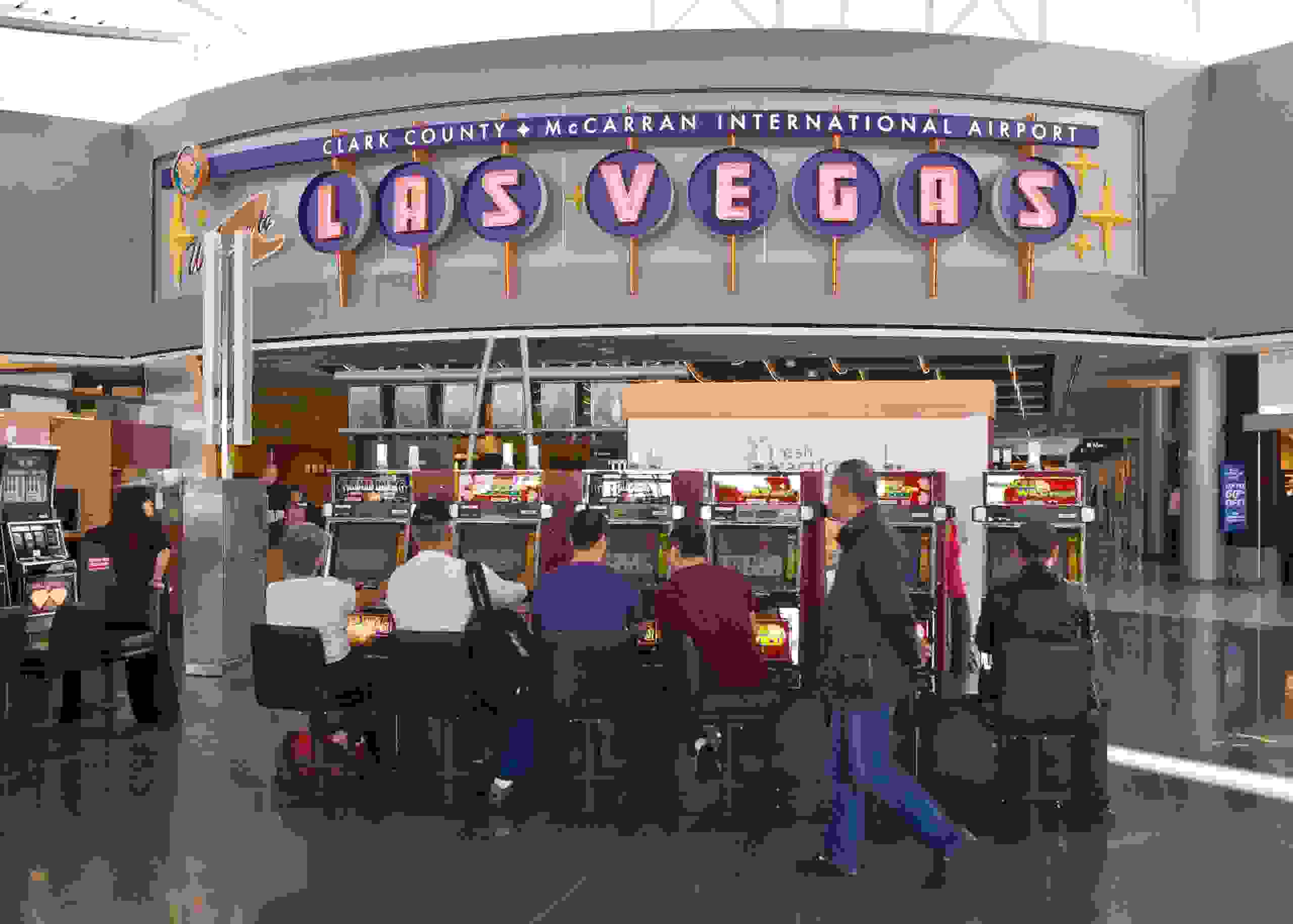 LAS VEGAS, NV - NOVEMBER 20: United Airlines passengers at McCarran International Airport (LAS) now get to use Terminal 3 for arrivals and departures on November 20, 2012 in Las Vegas, Nevada. Tourism in America's "Sin City" is slowly making a comeback from the Great Recession with visitors filling the hotels, restaurants, and casinos in record numbers. (Photo by George Rose/Getty Images)