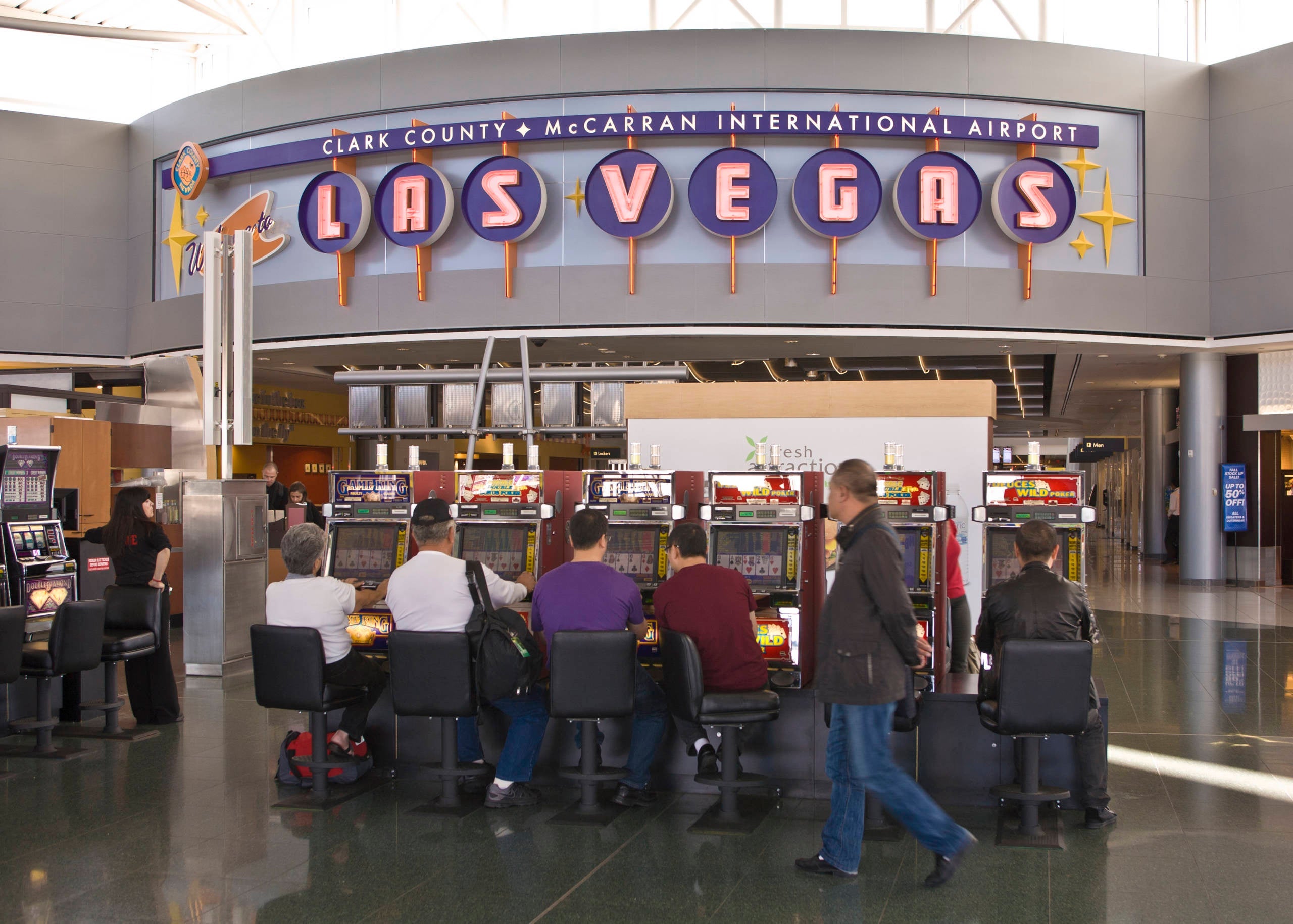 LAS VEGAS, NV - NOVEMBER 20: United Airlines passengers at McCarran International Airport (LAS) now get to use Terminal 3 for arrivals and departures on November 20, 2012 in Las Vegas, Nevada. Tourism in America's "Sin City" is slowly making a comeback from the Great Recession with visitors filling the hotels, restaurants, and casinos in record numbers.