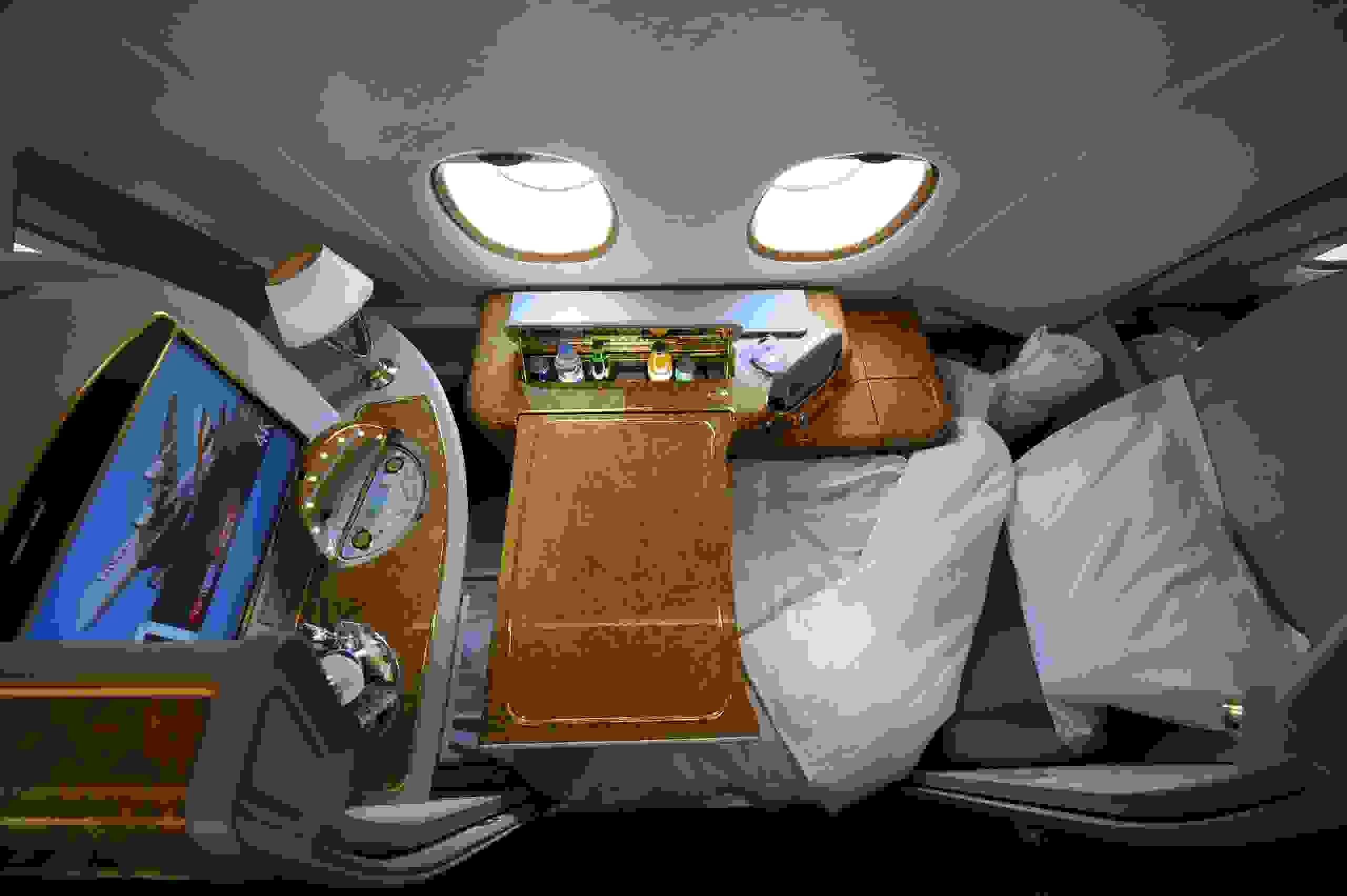 A first class seat configured for sleeping aboard an Emirates Airlines A380 on August 1, 2008. Emirates becomes the first commercial Airbus A380 jet to land in the United States at JFK International Airport in New York. The A380 is the world's largest airliner with 49 percent more floor space and 35 percent more seating than the previous largest aircraft. AFP PHOTO/Stan HONDA (Photo credit should read STAN HONDA/AFP/Getty Images)