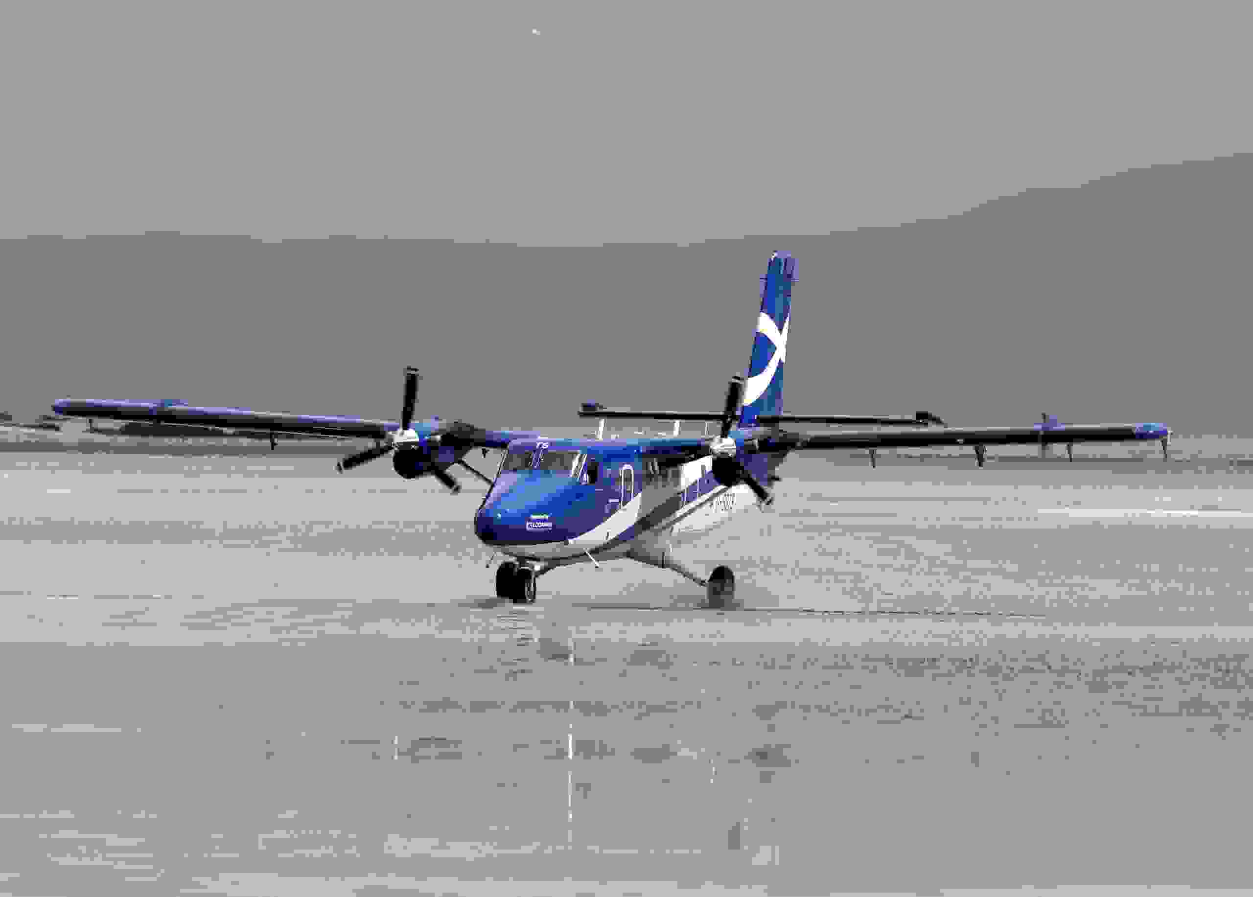 BARRA, SCOTLAND - JUNE 4: The plane carrying the coffin of Eilidh MacLeod arrives at Traigh Mhor beach near Barra airport on June 4, 2017 in Barra, Scotland. The body of the Manchester bomb victim was flown home to the devastated community on the island of Barra ahead of her funeral. The 14-year-old was among 22 people who died in the terrorist attack at the Ariana Grande concert on Monday May 22, which also left dozens injured. Photo by Andrew Milligan - WPA Pool / Getty Images)