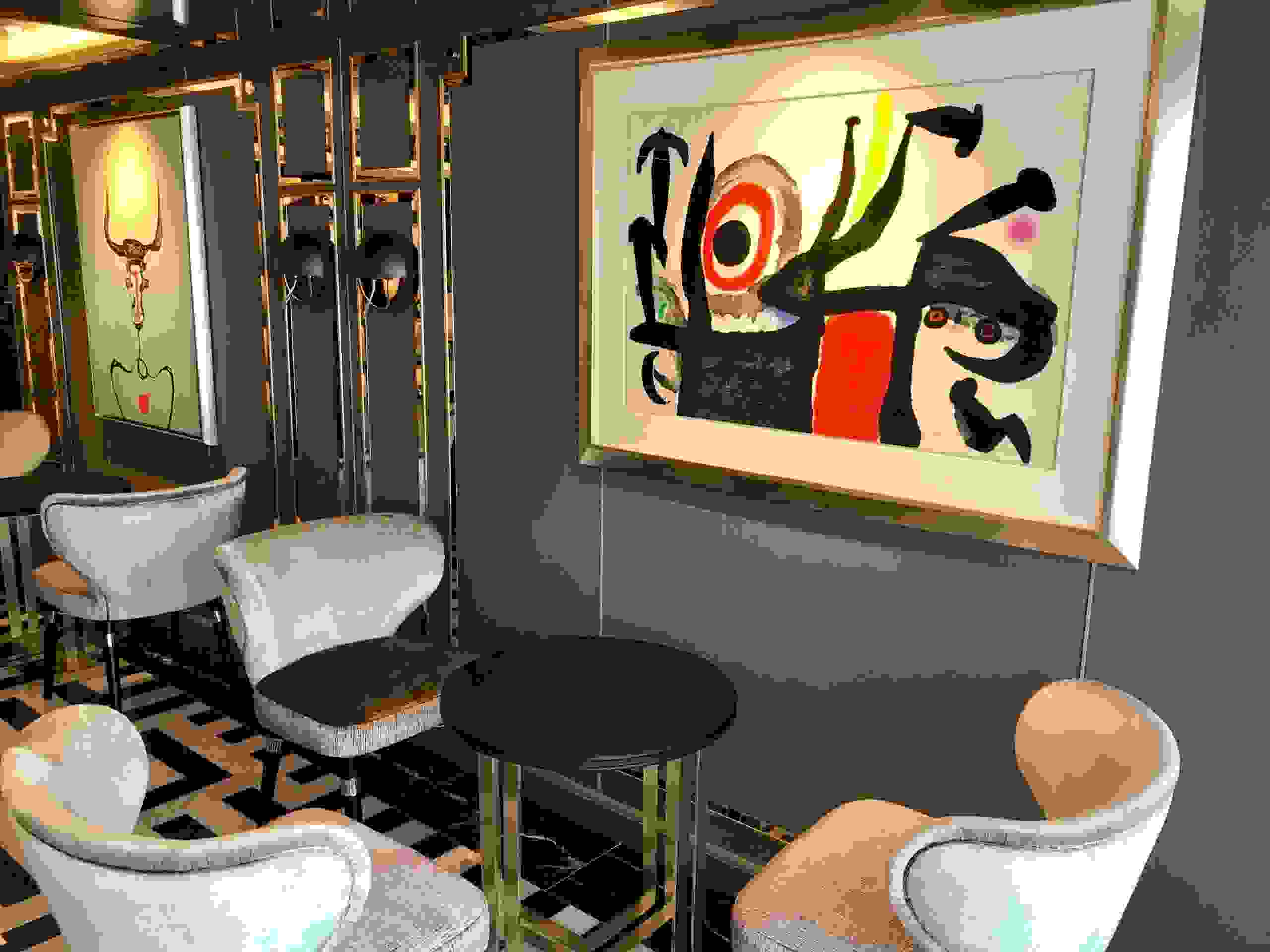 An art work by Joan Miro will be your companion during drinks in the Prime 7 steakhouse bar on Seven Seas Splendor. The room also has a Picasso. (Photo by Gene Sloan/The Points Guy)