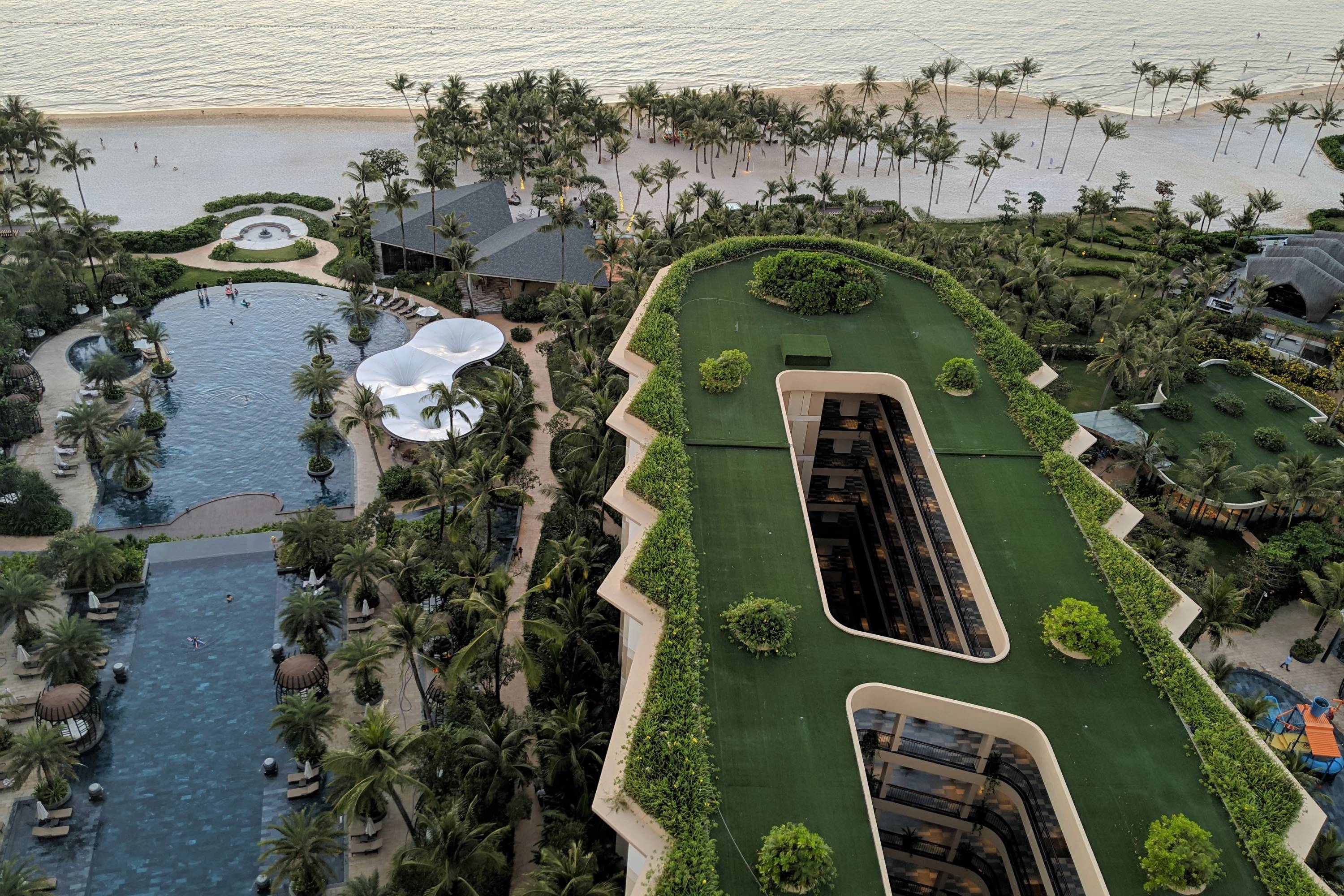 Rooms are located in four arms, as well as the Sky Tower (from which this photo was taken) and villas.