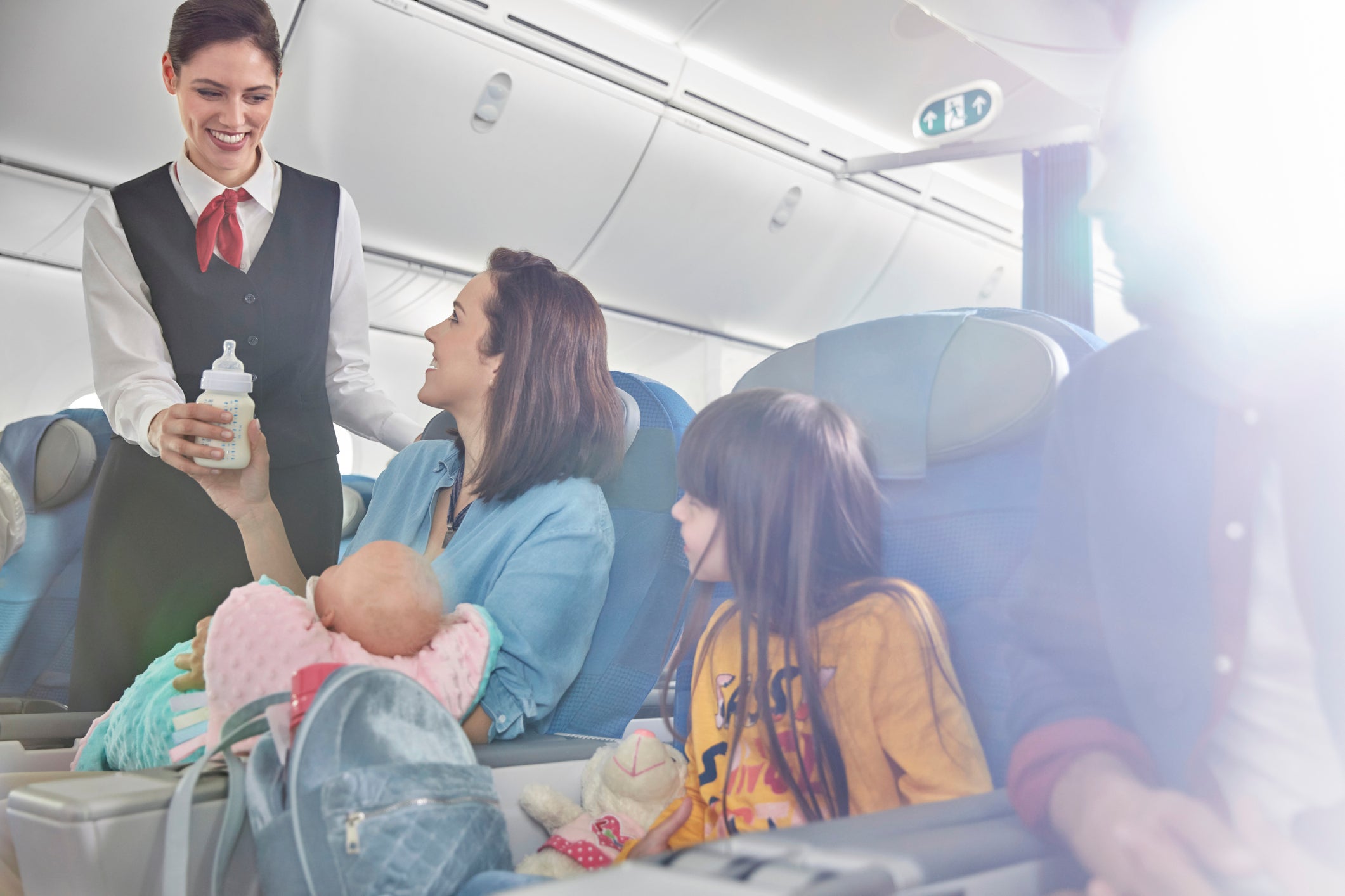 baby mother and flight attendant