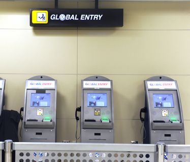 TR-TRUSTEDTRAVELER. DATE: November, 30, 2009 CREDIT: Katherine Frey / TWP. Dulles, VA. Global Entry Trusted Traveler machines at Dulles International that allow for faster processing through customs. Wilma van der Veer from the Netherlands breezes through customs through the Global Entry program.