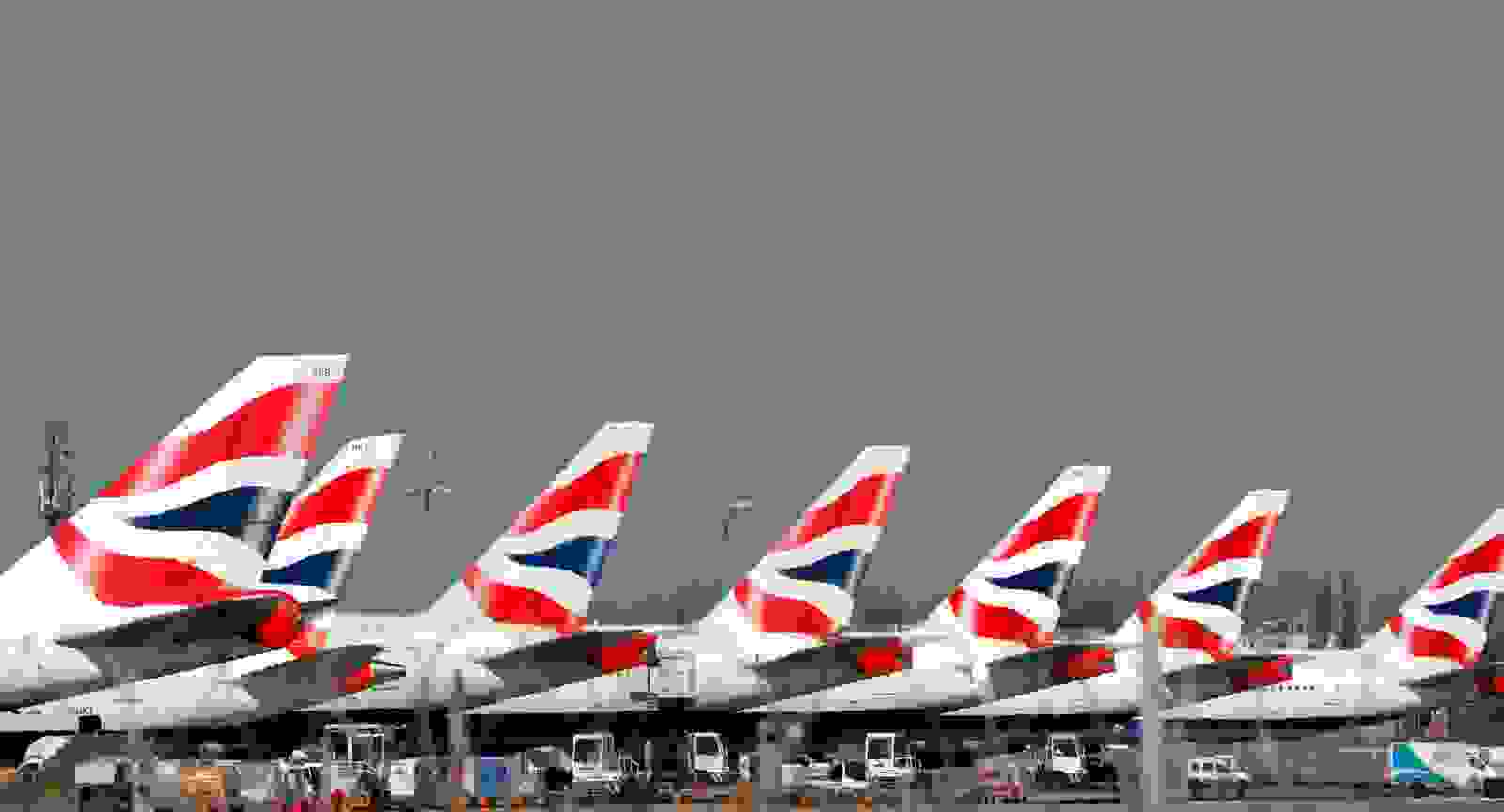 British Airways planes grounded at Heathrow's airport terminal 5. (Photo by ADRIAN DENNIS/AFP/Getty Images)