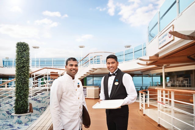 cruise crew members on deck