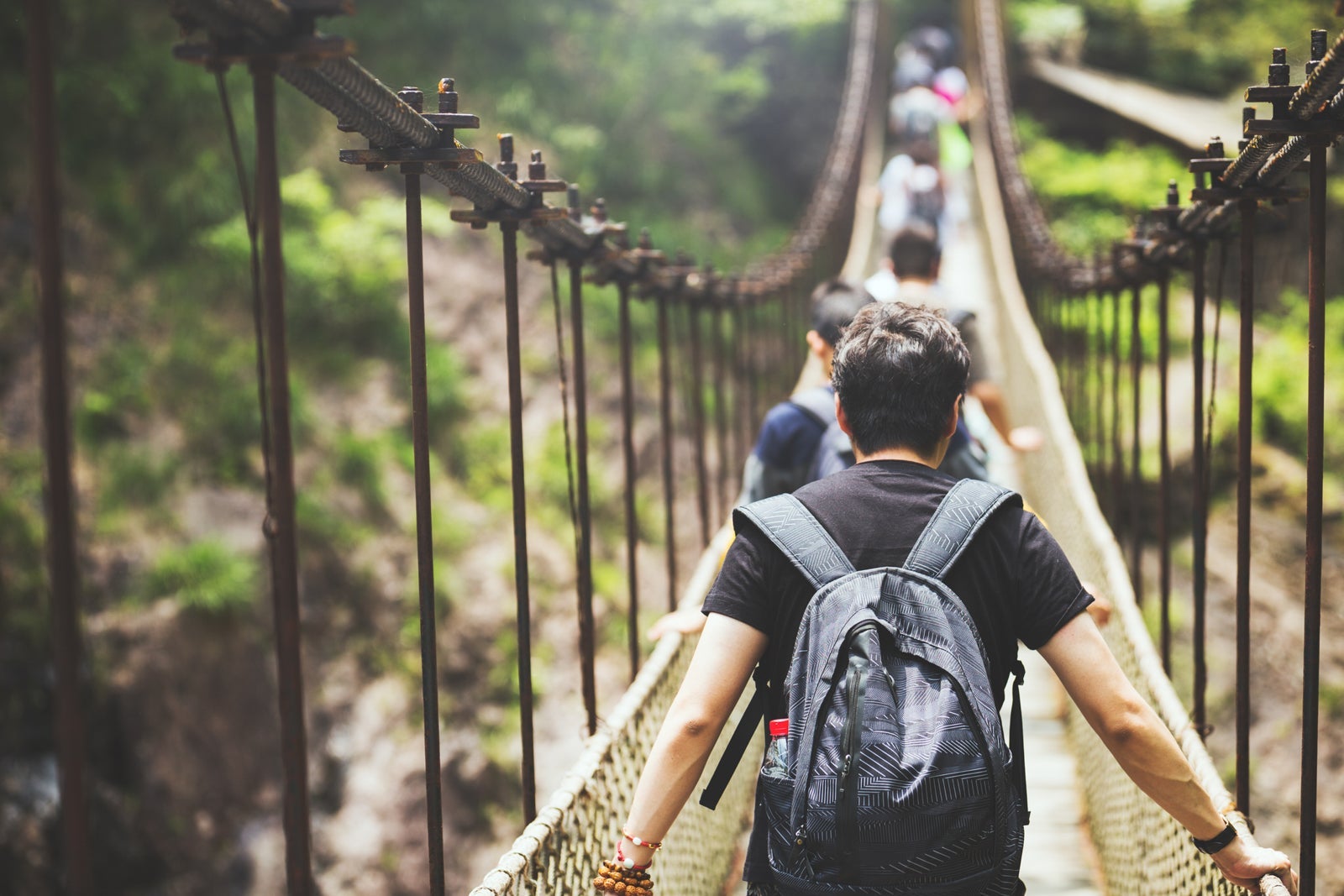 Person walking on a bridge