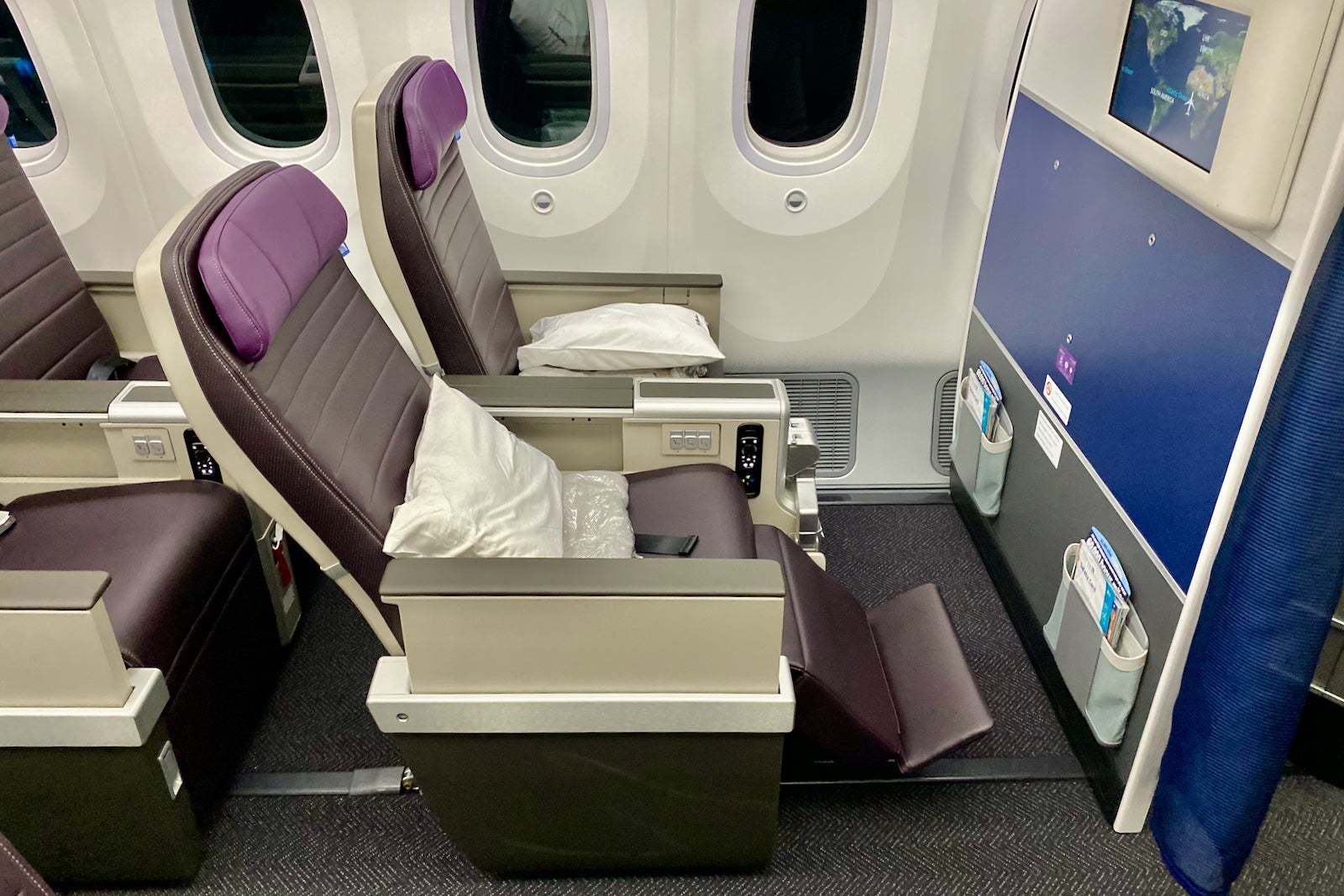 a reclined premium economy seat