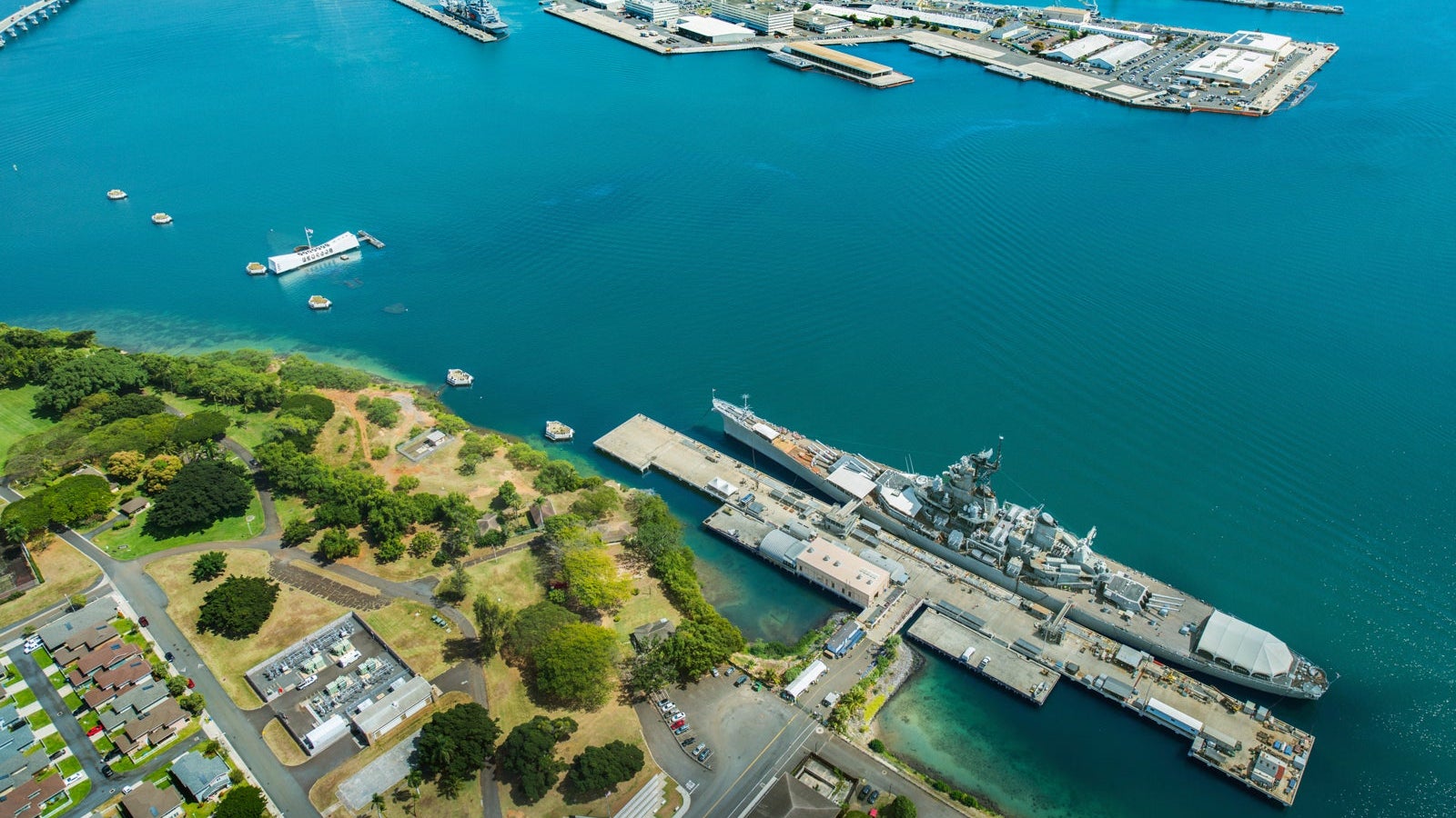 Aerial view of Arizona Memorial and Mighty Mo Missouri battleship at Pearl Harbor, Honolulu, Hawaii, USA