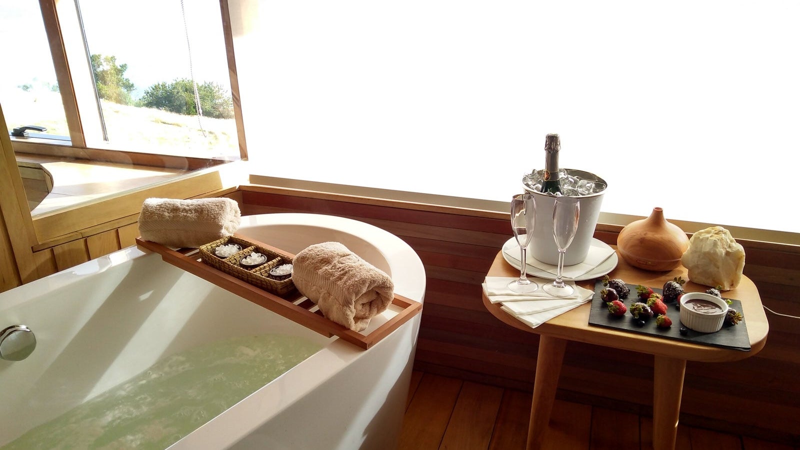 High Angle View Of Bathtub By Food And Drink In Bathroom