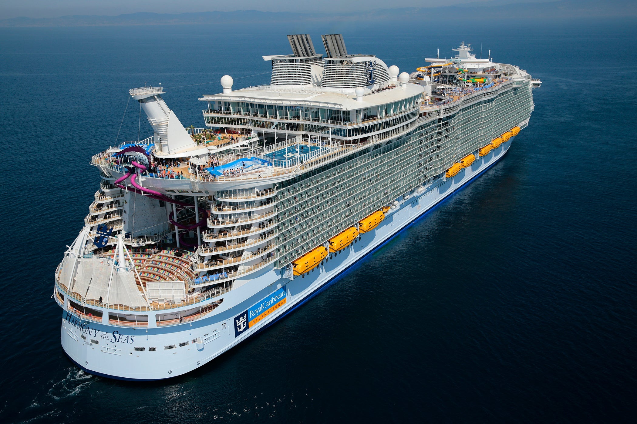 Aerial shot of the aft starboard angle of a cruise ship at sea