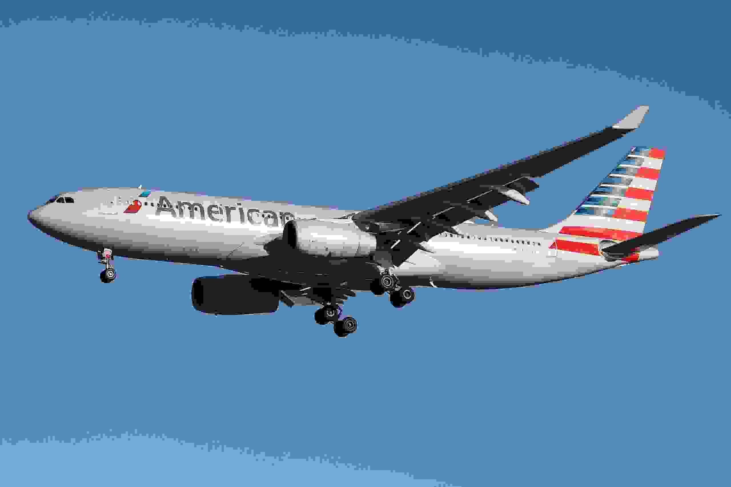 American Airlines Airbus A330-200 ( A330-243 ) aircraft landing at London Heathrow International Airport in England, UK in blue sky. The airplane registration is N283AY and has 2 RR Trent 700 engines. AAL or AA is a member of Oneworld aviation alliance. (Photo by Nicolas Economou/NurPhoto via Getty Images)