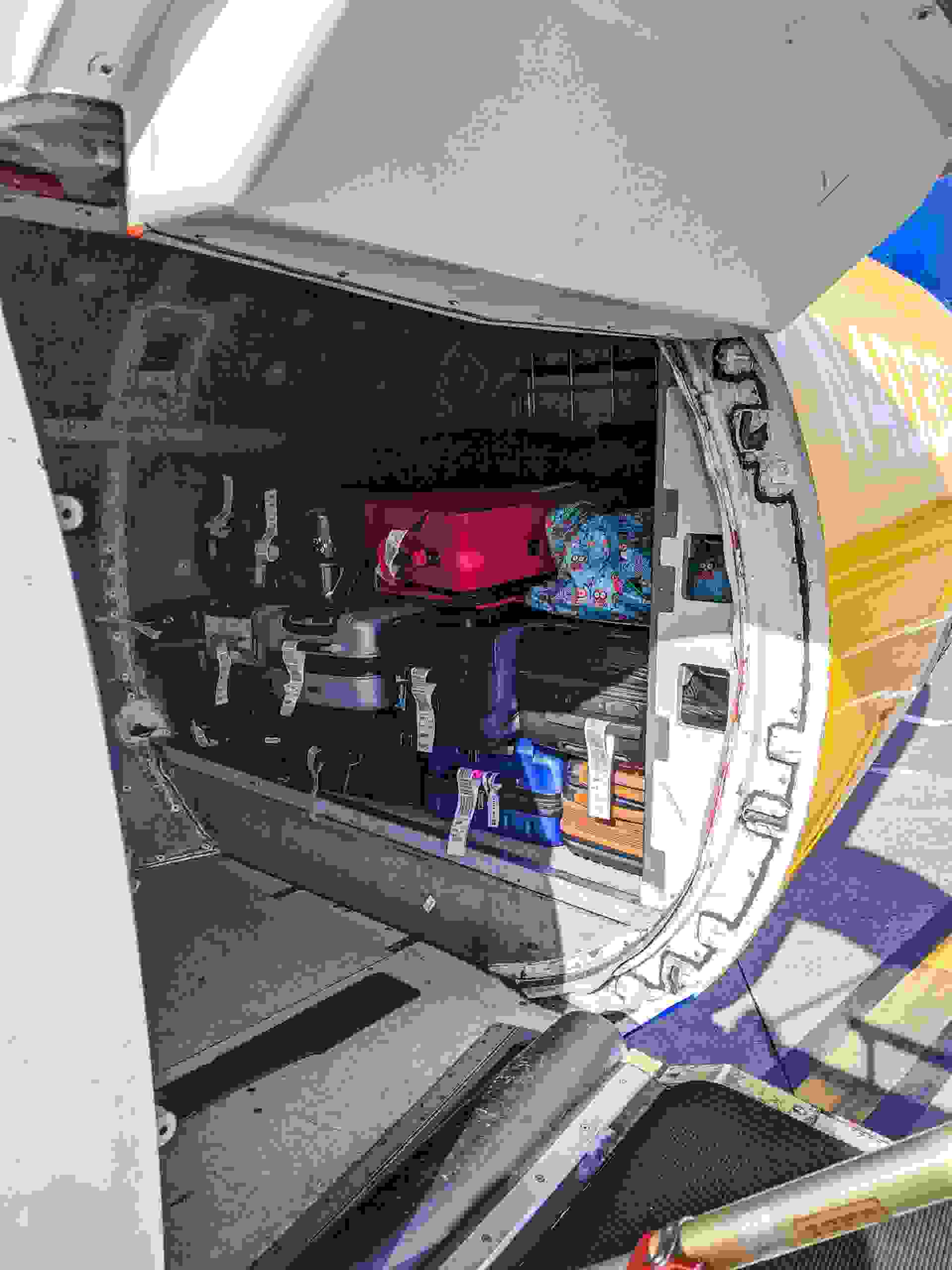 The small luggage hold on the Dash 8 really drives home the importance of packing lightly on small planes.