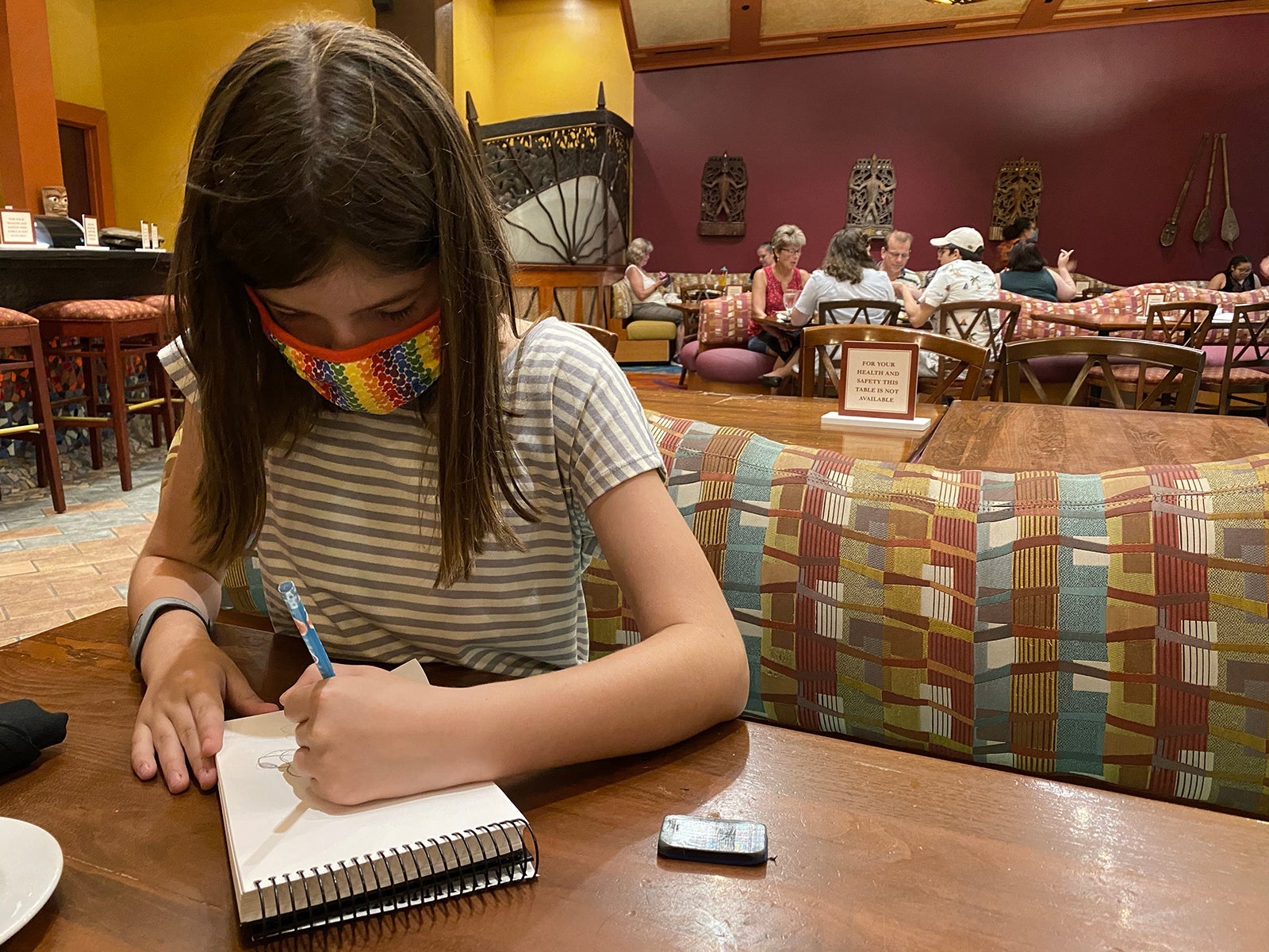 Girl sketching at Disney Polynesian Resort