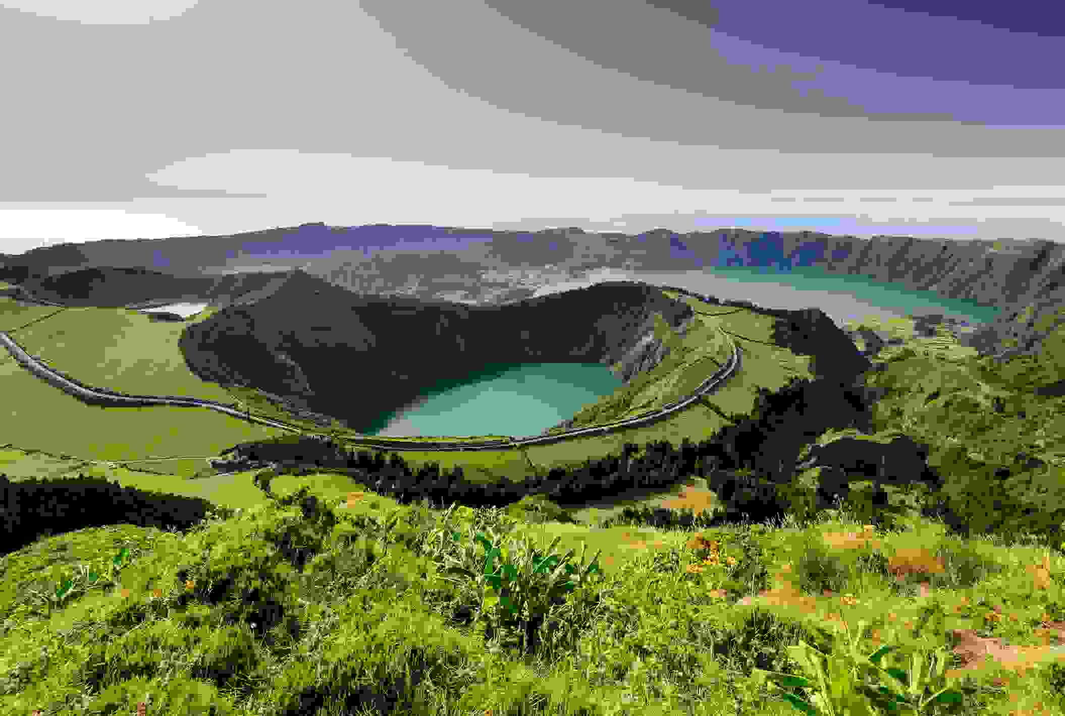 See sights like Santiago Lake, Rasa and lagoa Azul and Lagoa Seven Cities in the Azores. (Photo by ARoxo / Getty Images)