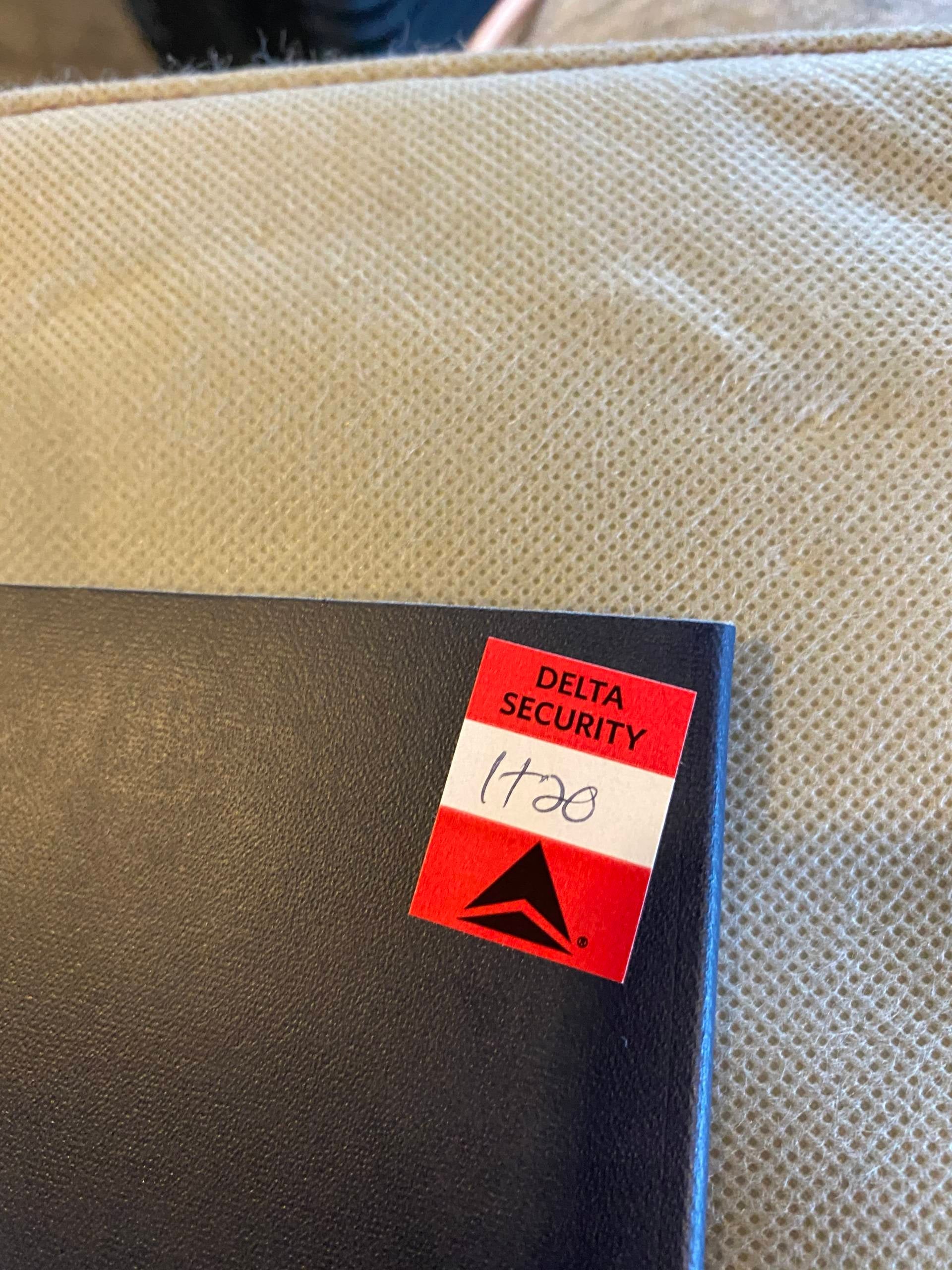 Delta passport security sticker after temperature check