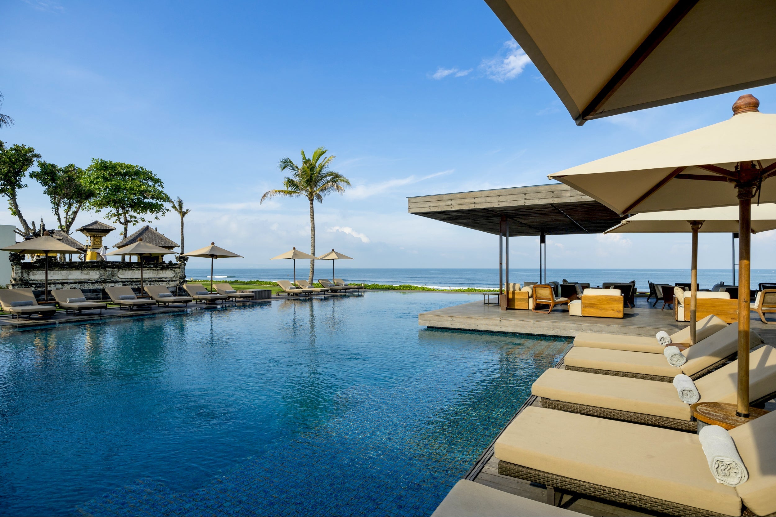Alila Seminyak Pool with tan loungers
