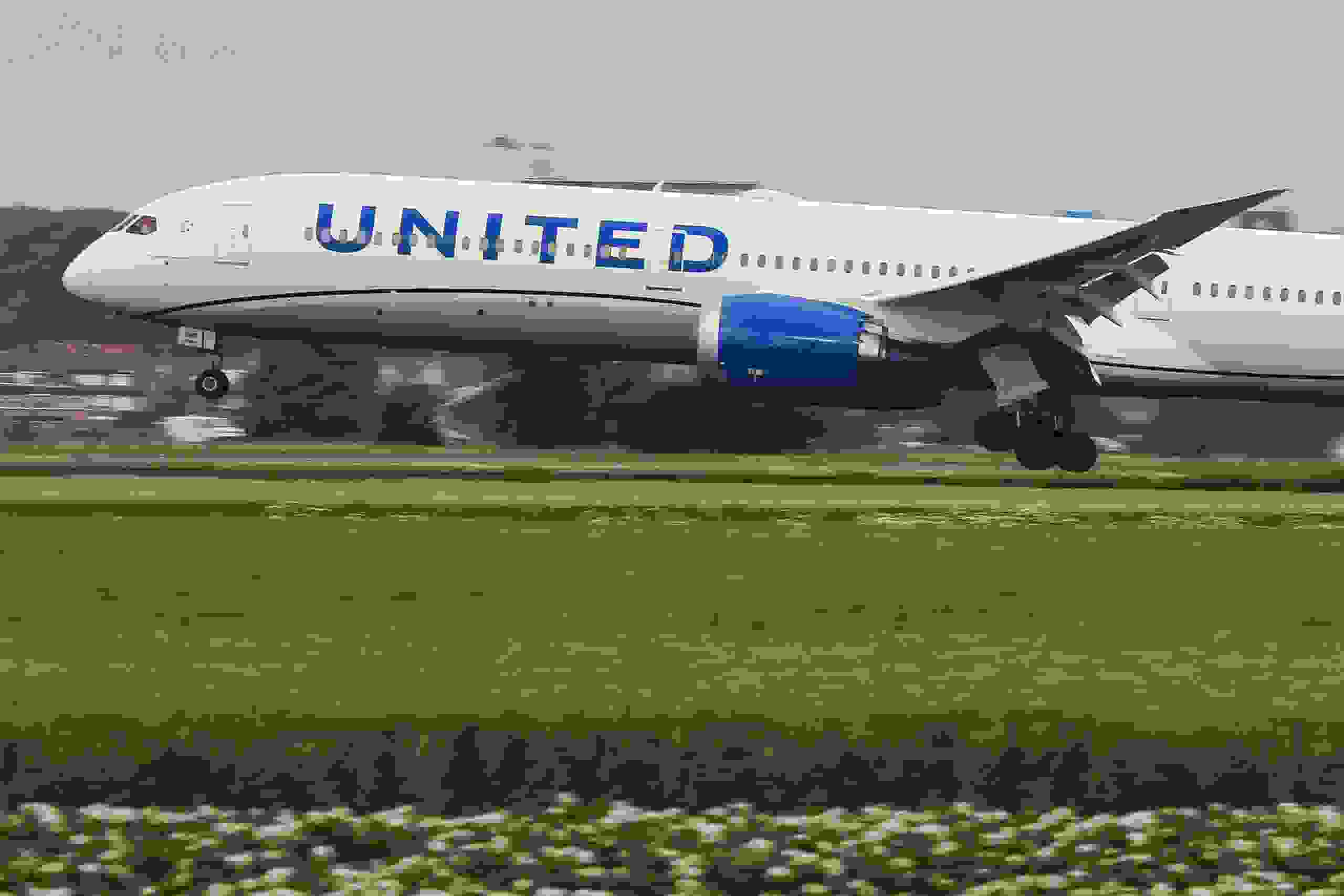United Airlines Boeing 787-10 Dreamliner aircraft as seen on final approach landing at Amsterdam Schiphol AMS EHAM Airport in the Netherlands, on July 2, 2020, arriving from Newark EWR New York, NY, USA. The advanced wide body, modern and advanced airplane has the new livery paint scheme and the registration N12010 and 2x GE jet engines. United UA UAL is the third largest airline in the world and a member of Star Alliance aviation alliance. United is connecting US with Europe and the Netherlands with Cargo and passenger flight during the Covid-19 Coronavirus Pandemic period. (Photo by Nicolas Economou/NurPhoto via Getty Images)