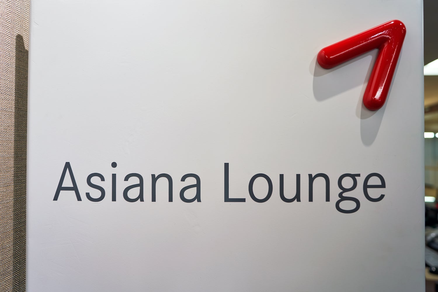 Sign That Reads Asiana Lounge