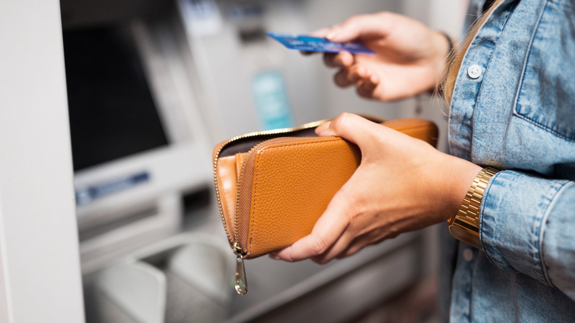 Woman withdrawing money from ATM