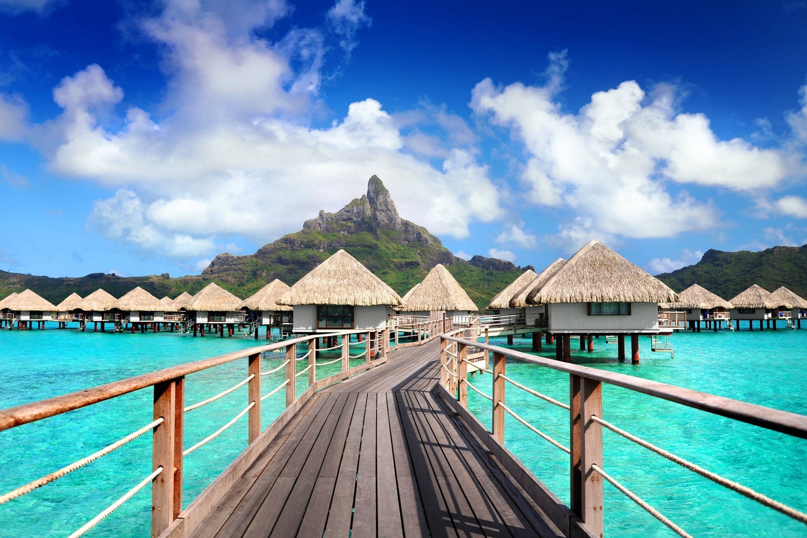 pathway to overwater bungalows at a hotel