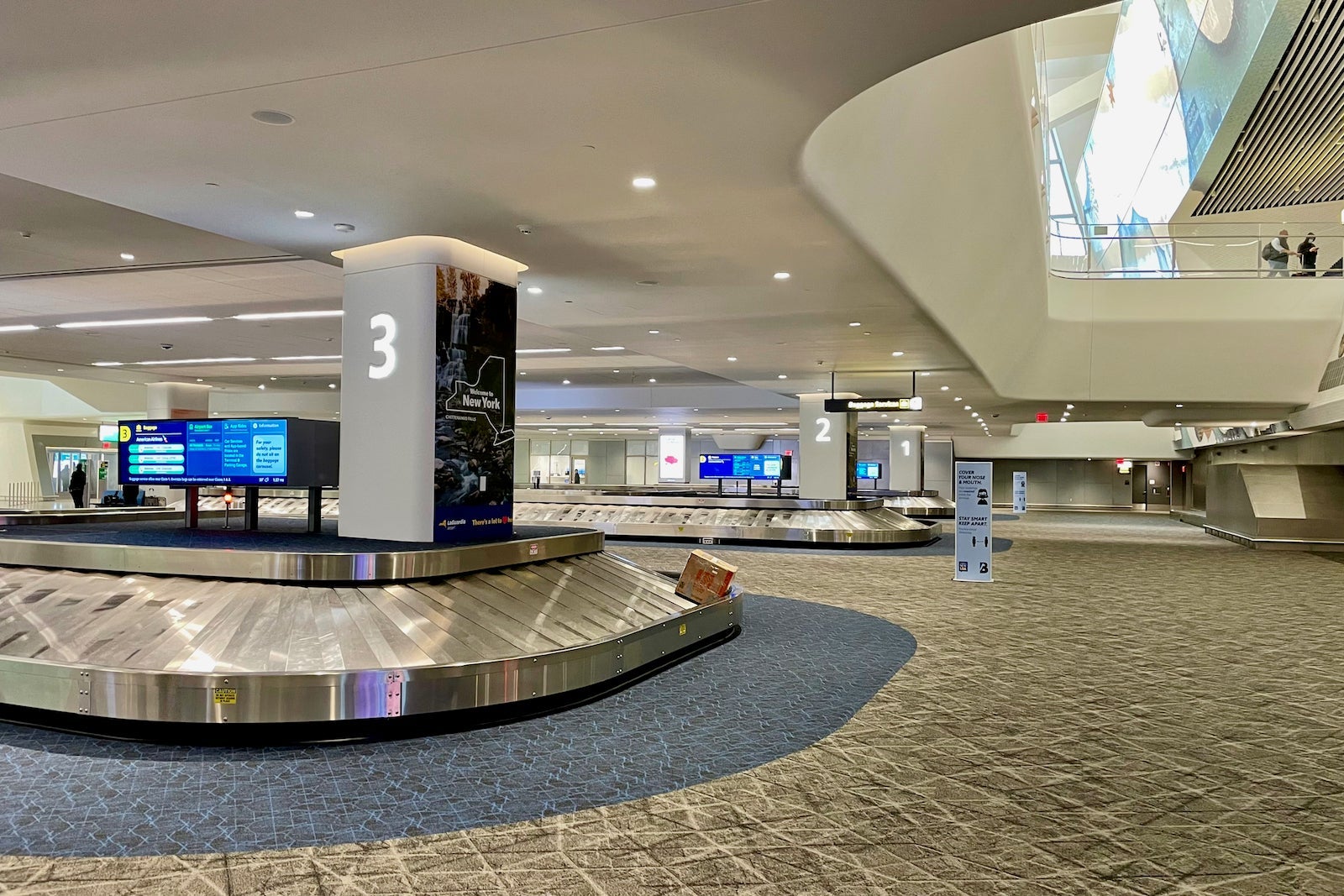 Image of a checked baggage carousel in an airport