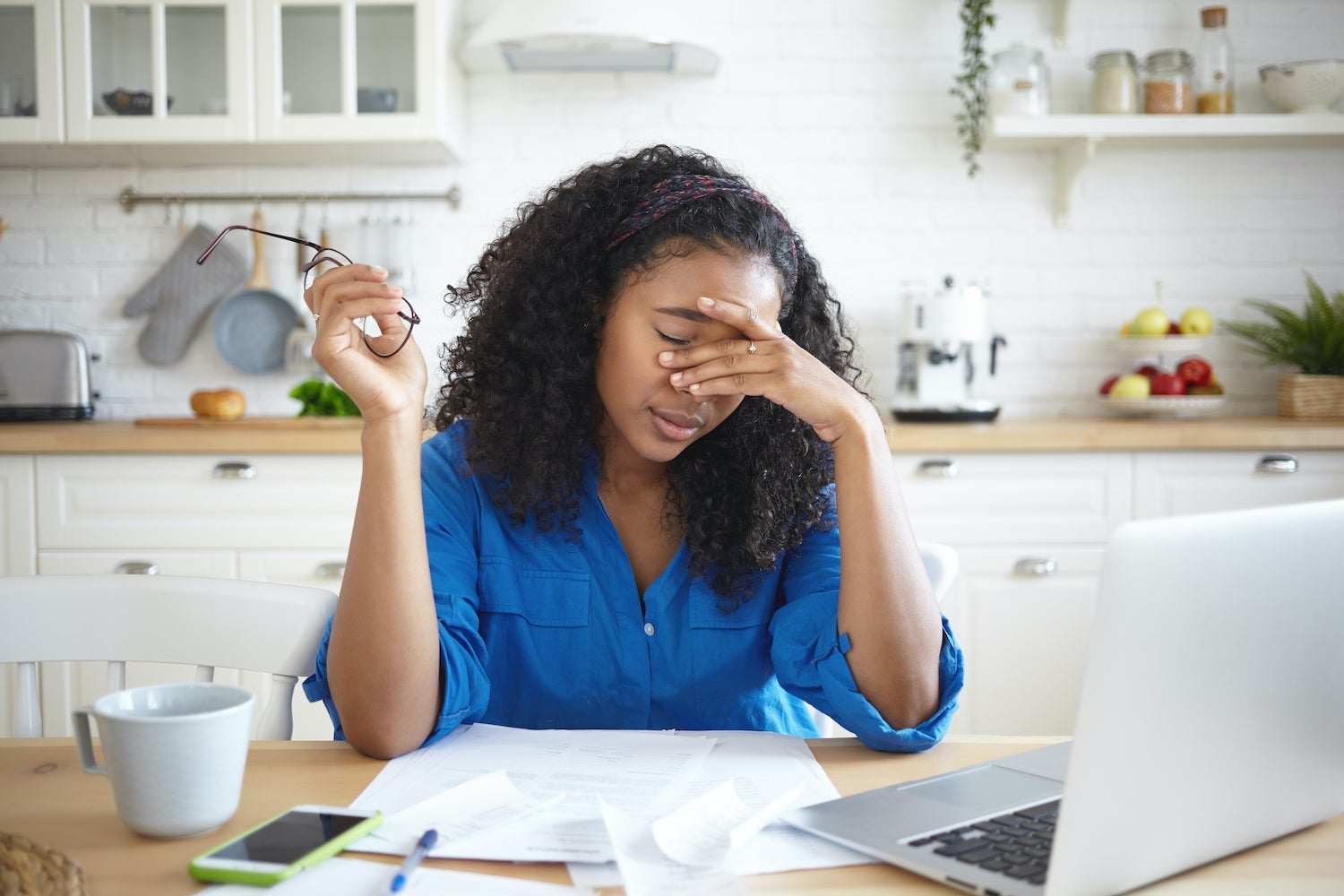 Stressed Woman in Front of Laptop