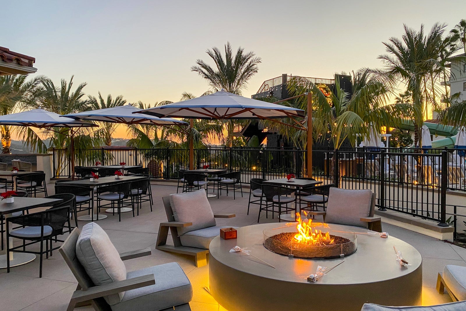 chairs around a small fire at a hotel