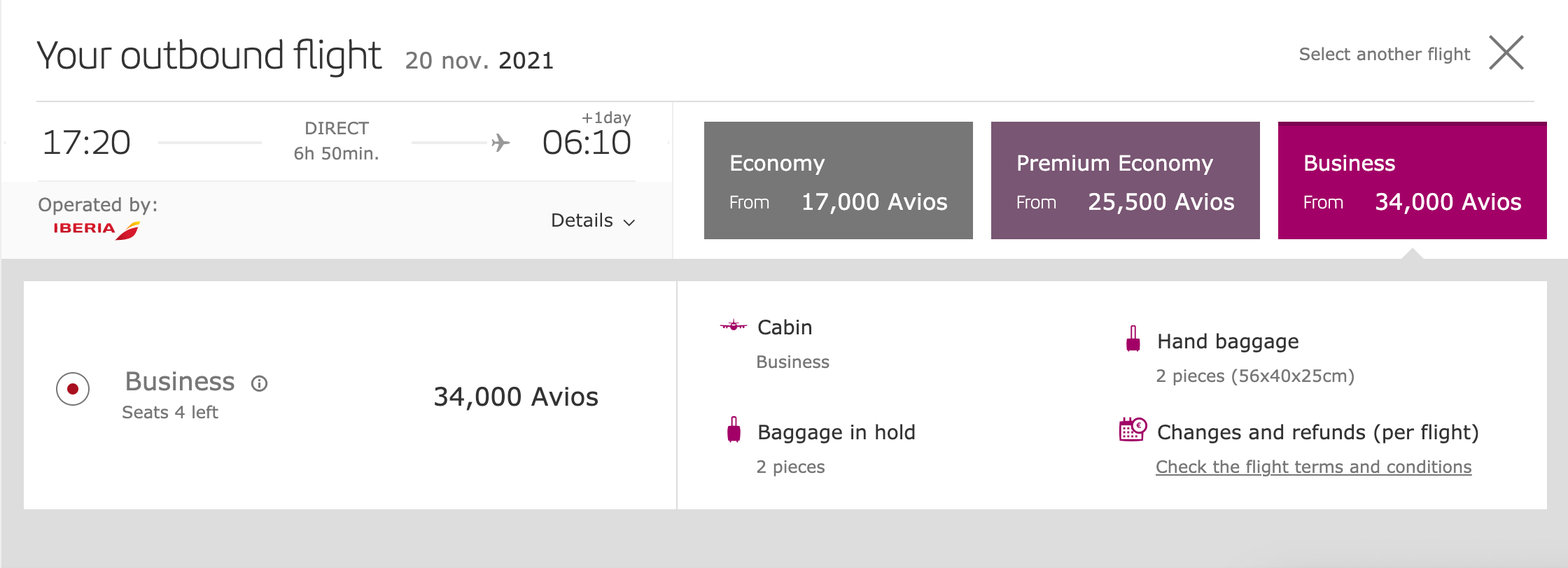 Business-class seats for four passengers on Iberia from Boston to Madrid on November 20, 2021