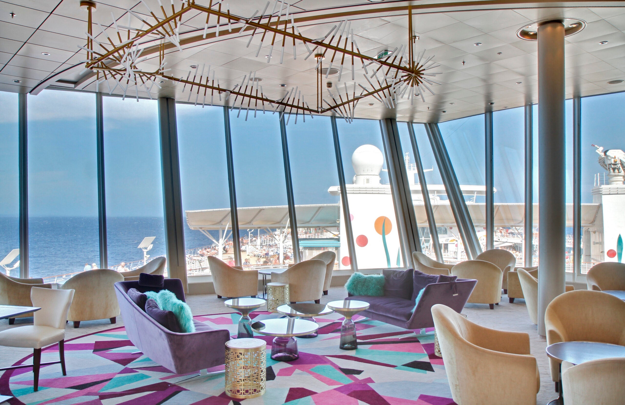 A lounge for suite guests on Allure of the Seas