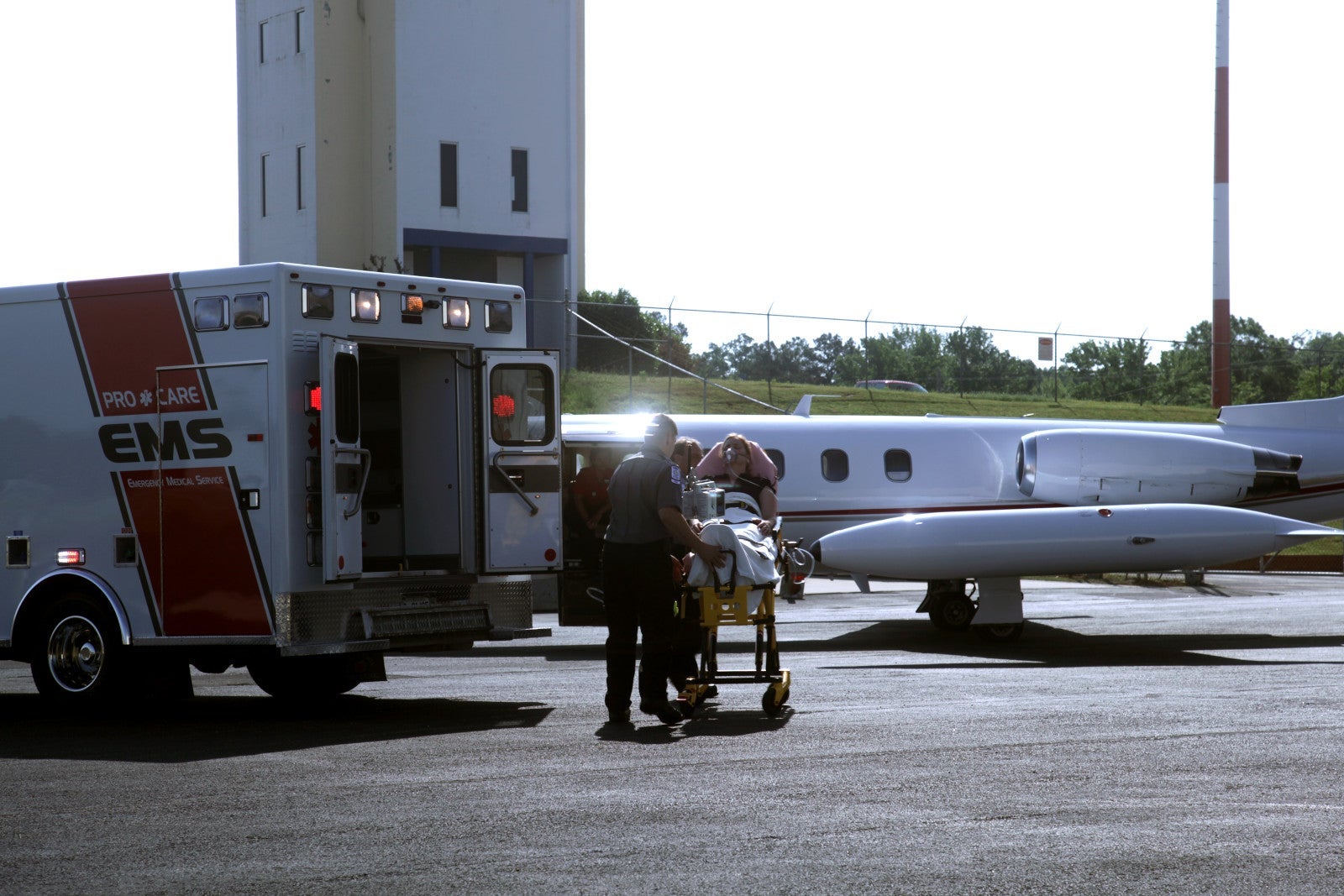 Medjet transferring patient to plane