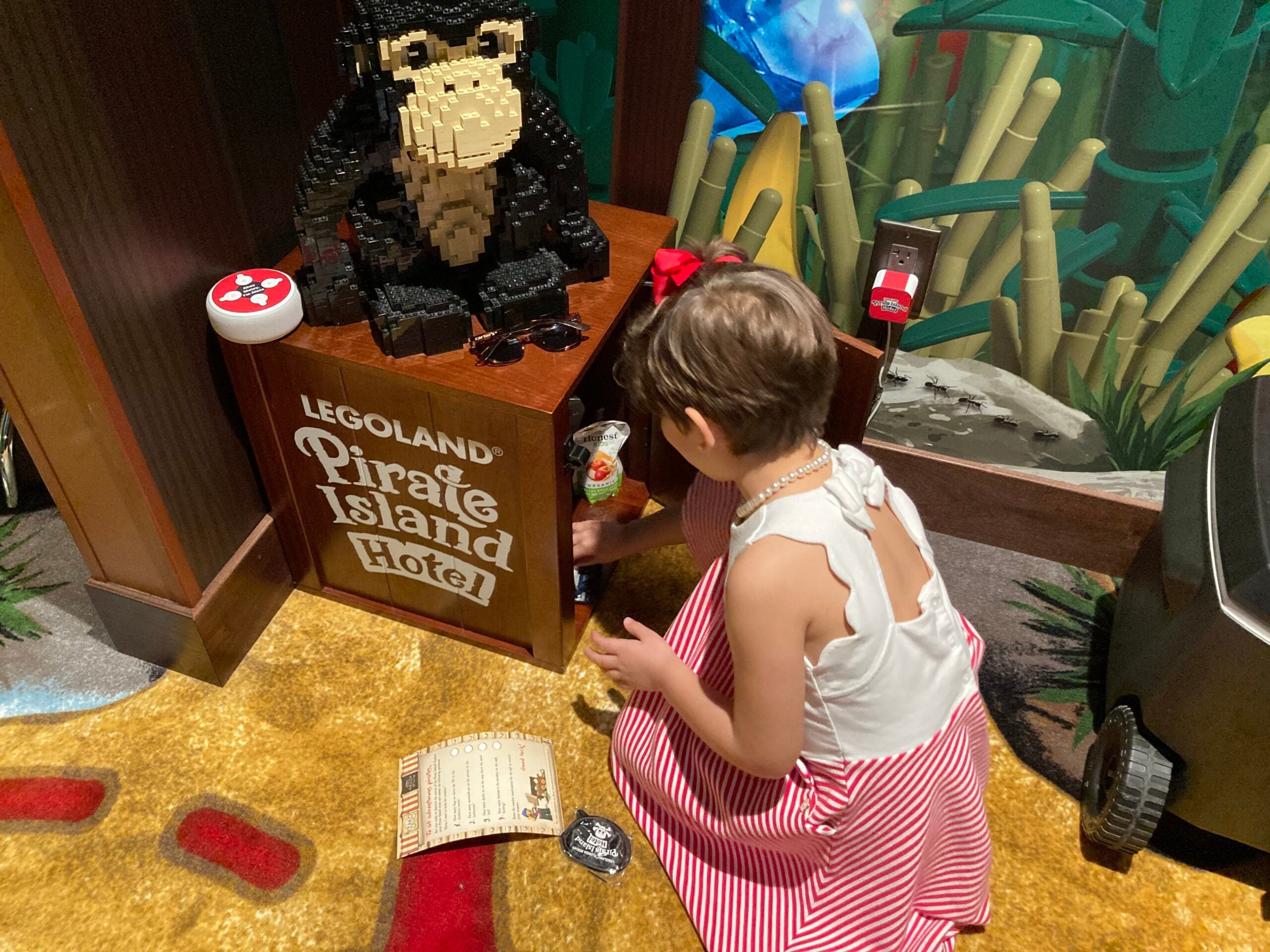 Finishing the in-room treasure hunt at Pirate Island Hotel at Legoland Florida