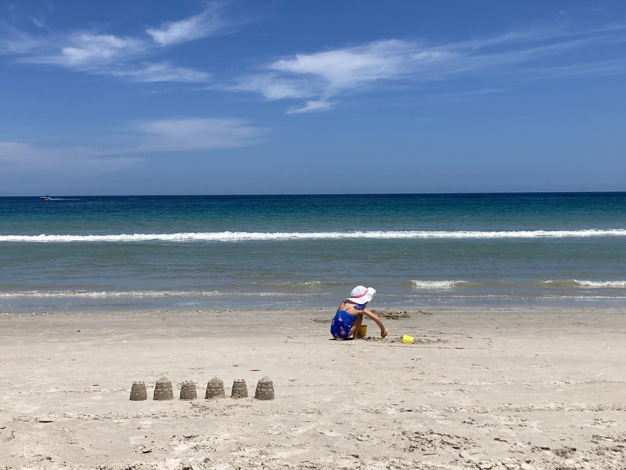 The daughter of TPG's Nick Ewen playing in the sand in Fort Pierce, FL
