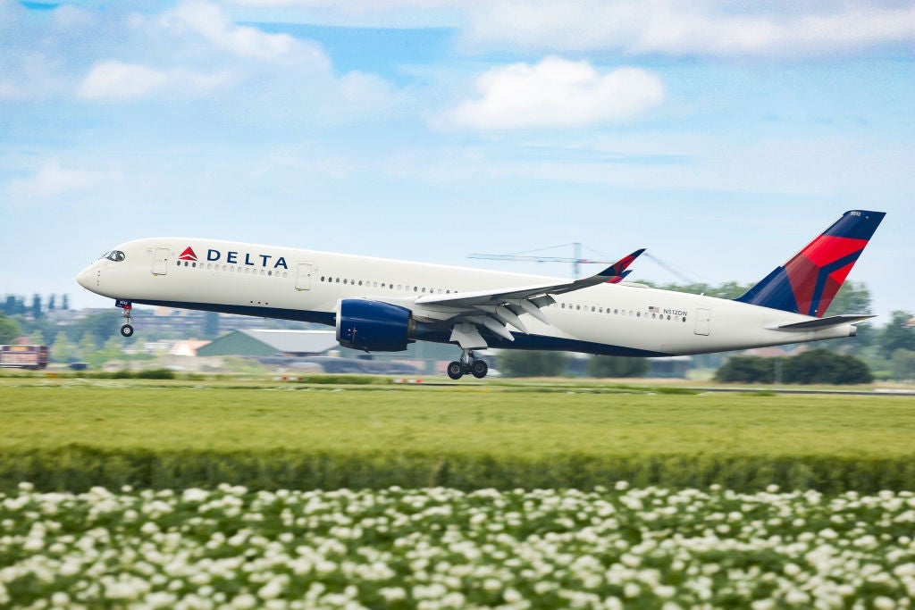 Delta Air Lines Airbus A350-900 aircraft as seen on final approach landing at Amsterdam Schiphol AMS EHAM airport in the Netherlands. The Delta Airlines modern and advanced wide-body airplane has the registration N512DN and is powered by 2x RR jet engines. Delta DL DAL is ranked the second-largest airline in the world with headquarters in Atlanta, Georgia US and is a member of SkyTeam airline aviation alliance. Delta is connecting with transatlantic flights the United States of America with the Netherlands and Europe during the Covid-19 Coronavirus pandemic era. July 2, 2020 (Photo by Nicolas Economou/NurPhoto via Getty Images)