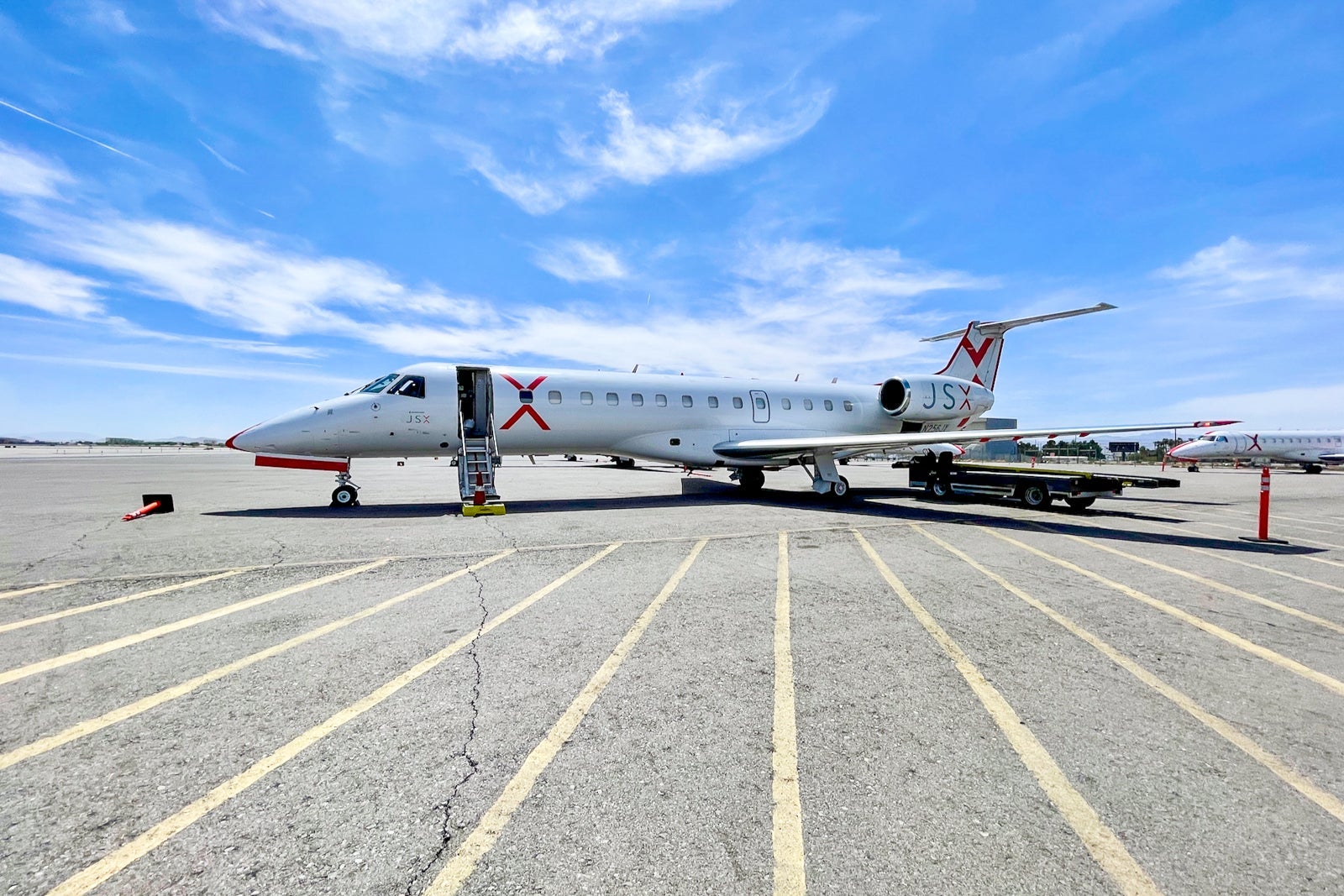 JSX plane on the runway
