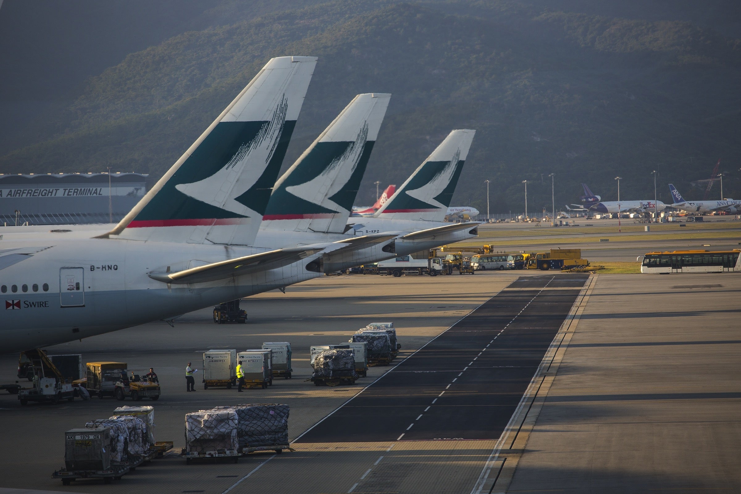 Cathay Pacific planes on the ground at Hong Kong airport