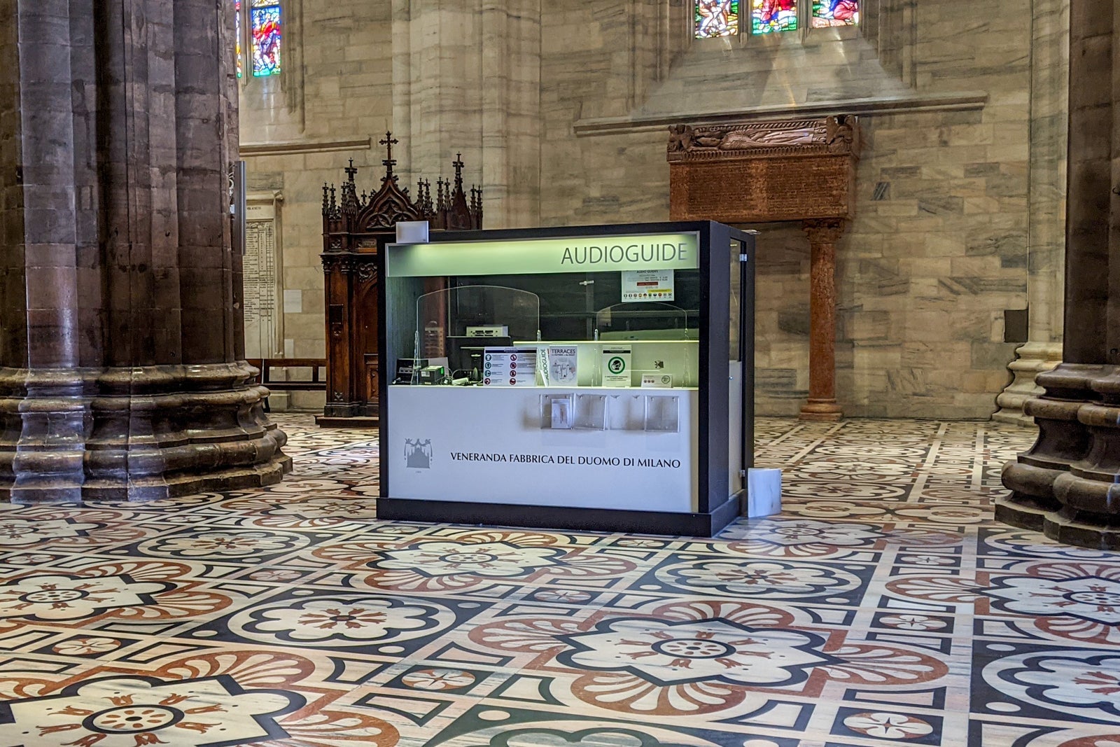 Unstaffed audio guide book at the Milan Cathedral in Italy