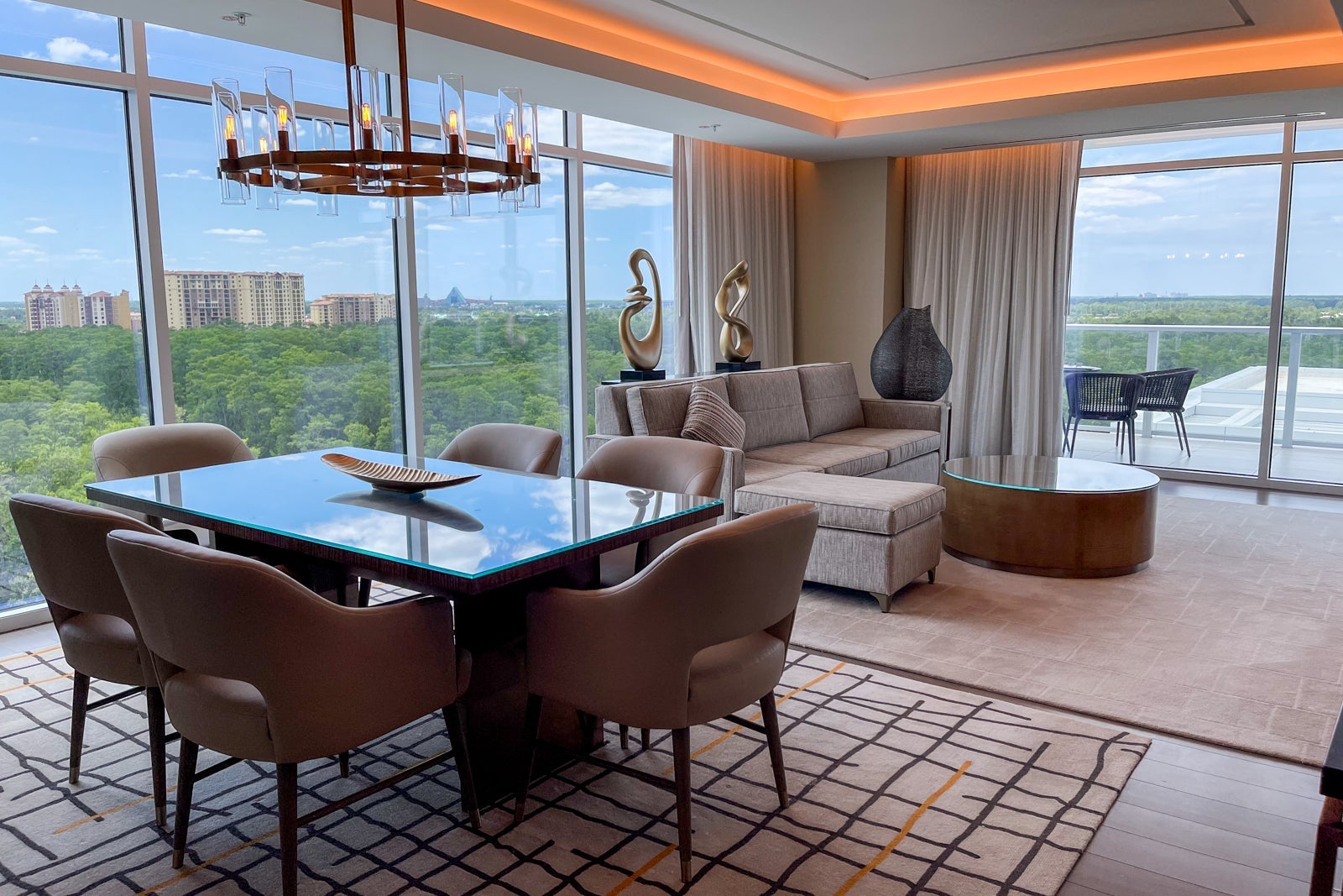 dining table and living room in suite at JW Marriott Orlando Bonnet Creek