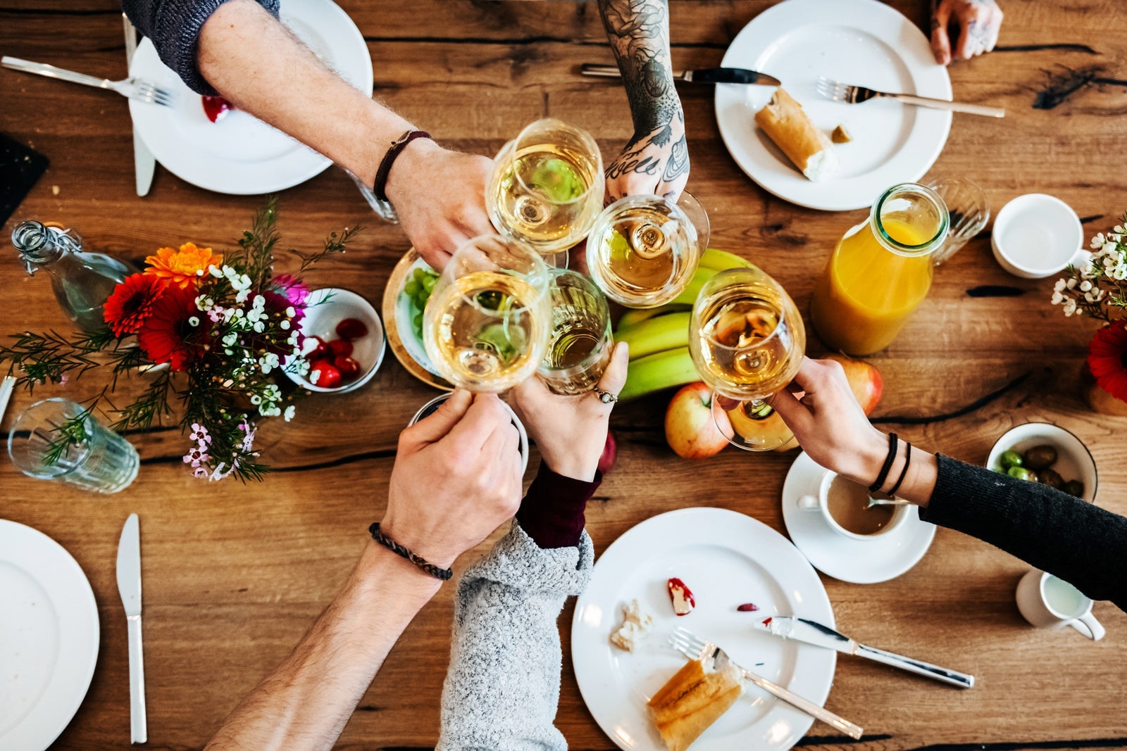 Group of people toasting with wine