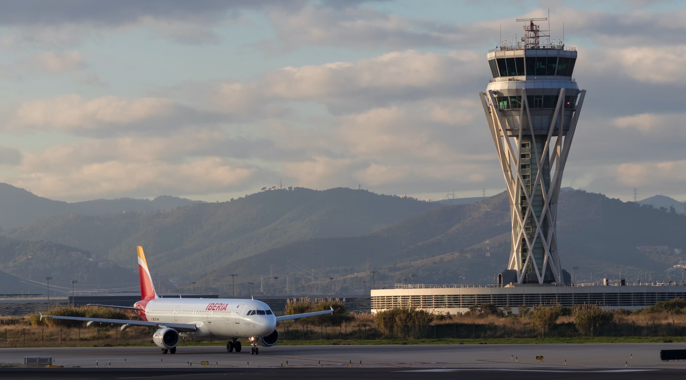 An Iberia Airbus A321 on the runway at Barcelona airport