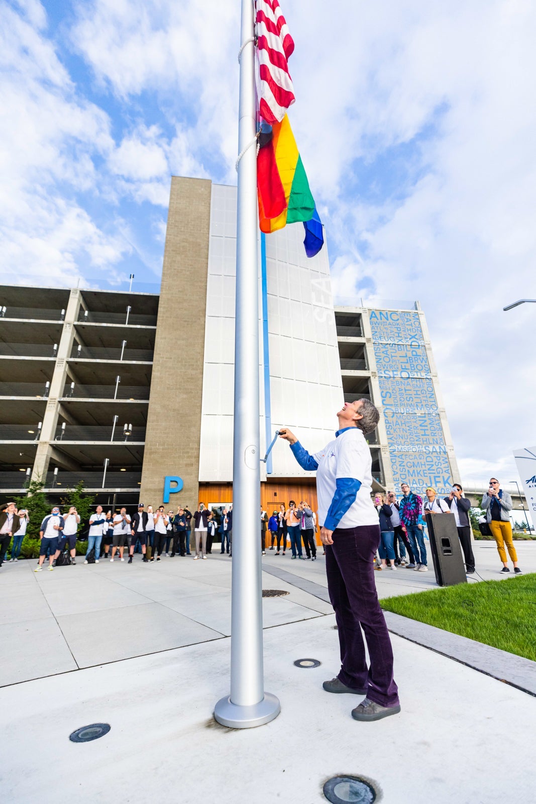 Pride flag being raised at Alaska Airlines Seattle headquarters on Tuesday June, 16, 2021. (Photo courtesy of Alaska Airlines)