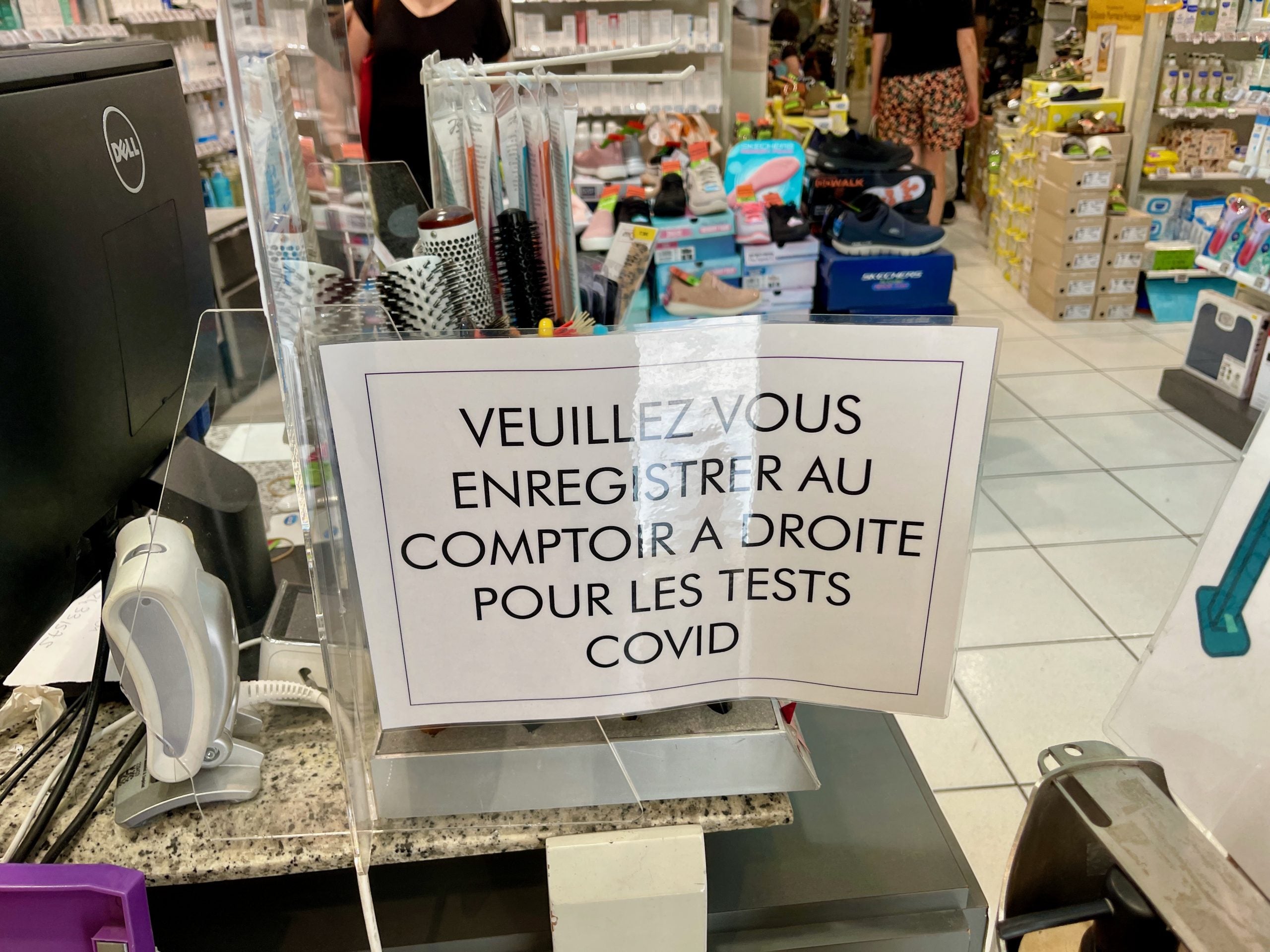 COVID testing sign inside pharmacy in Nice, France