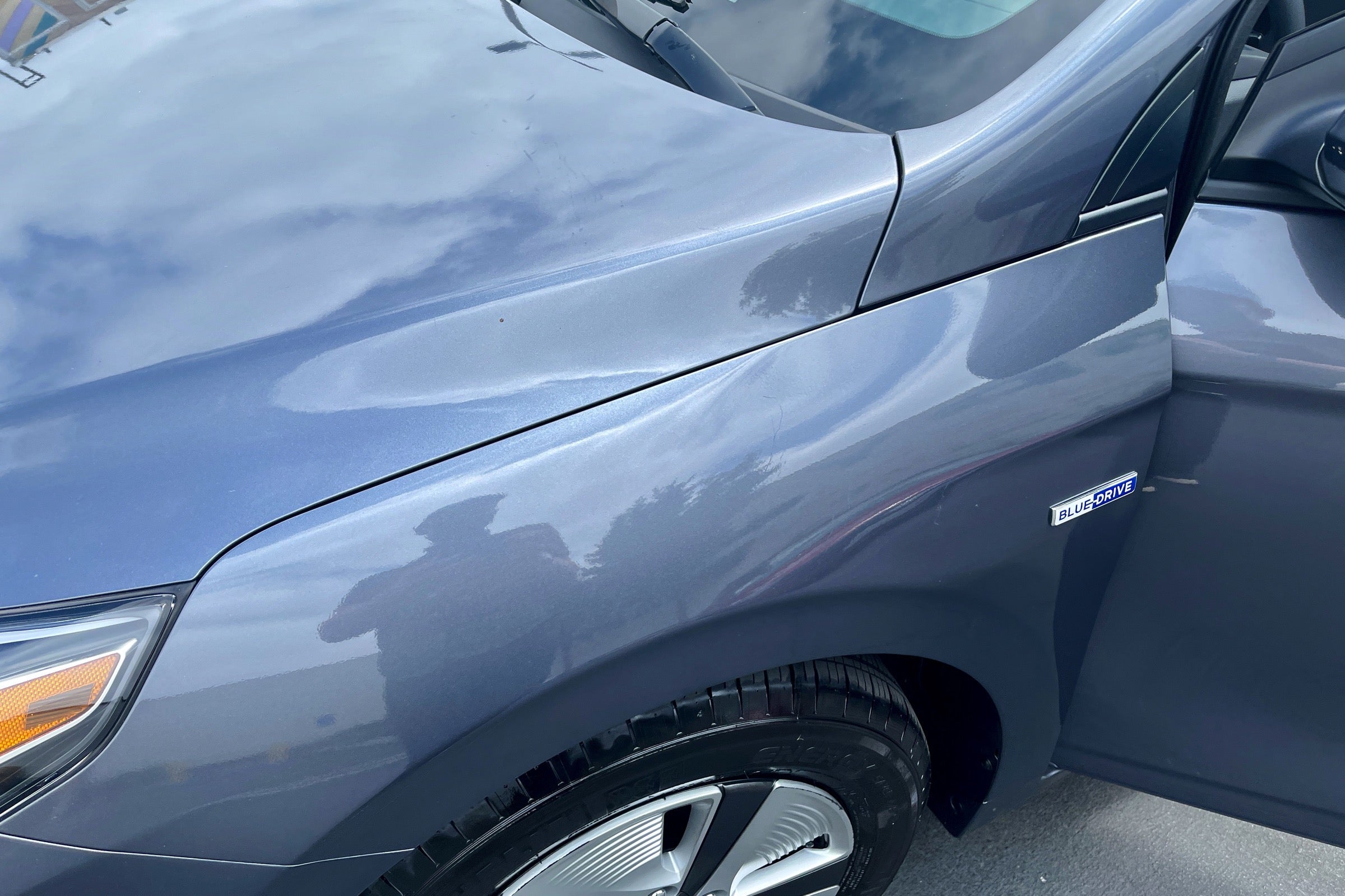 Minor scratches on Hyundai Ioniq hood and front fender