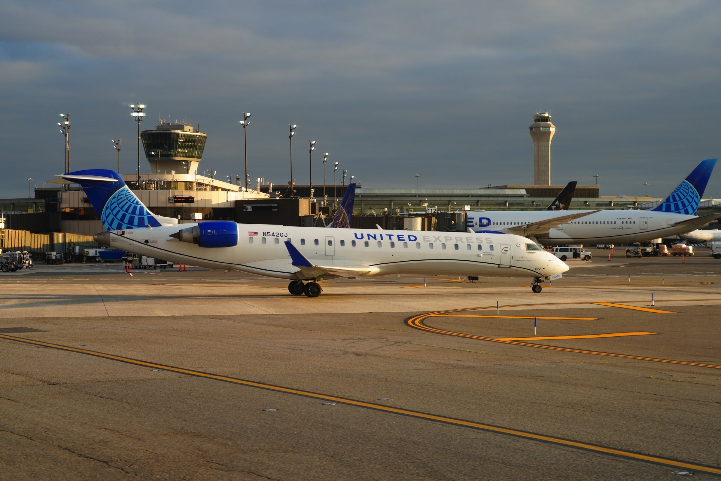 United Airlines commuter jet on the runway