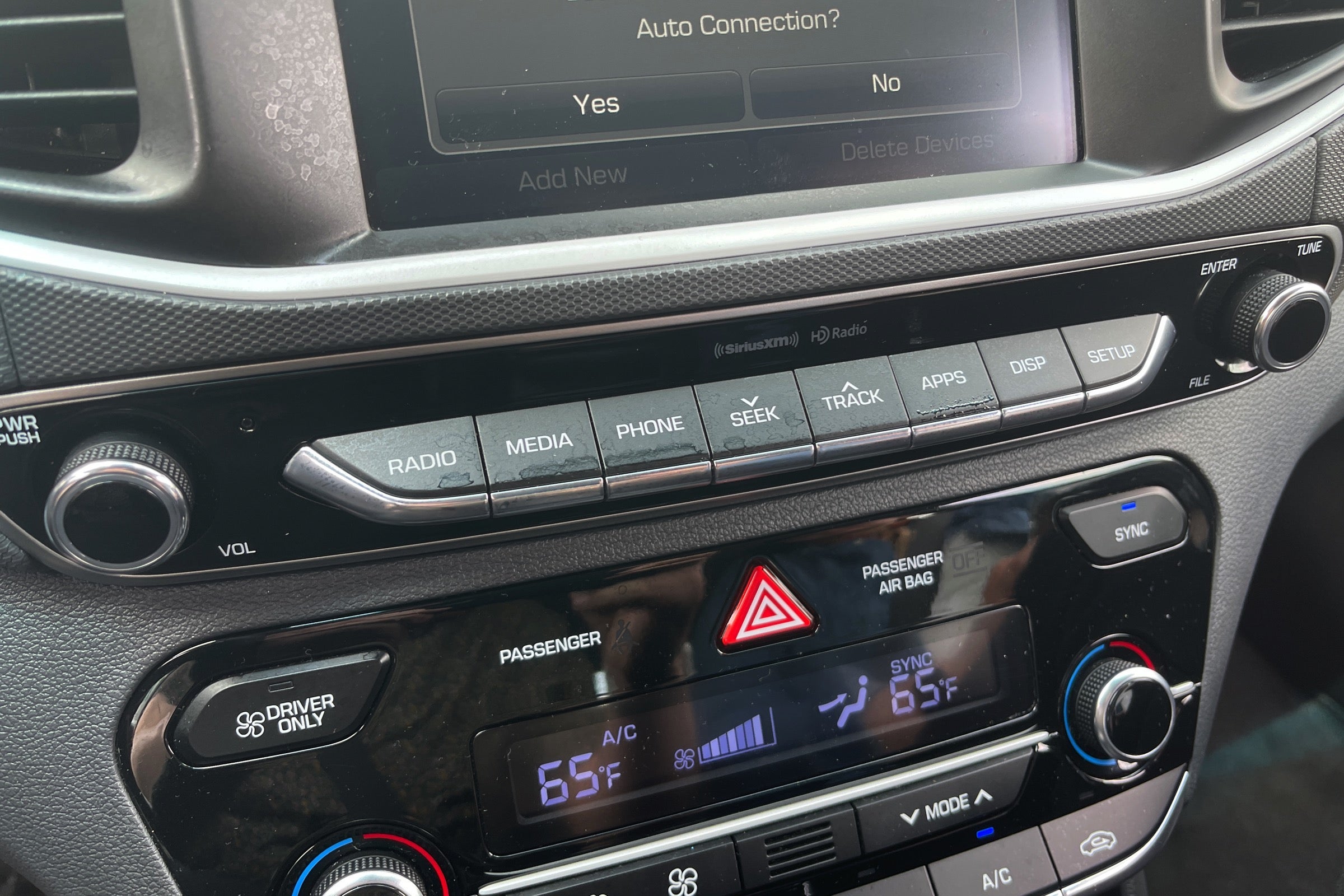 Worn car radio buttons