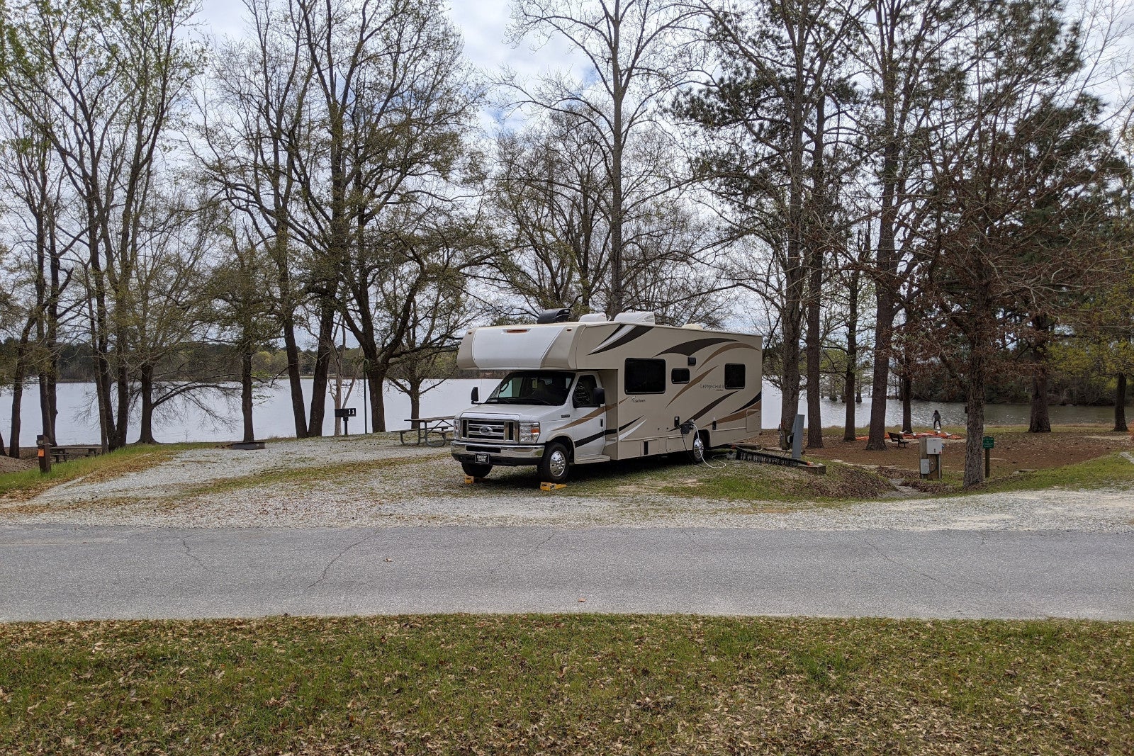 RV in a campground by a lake