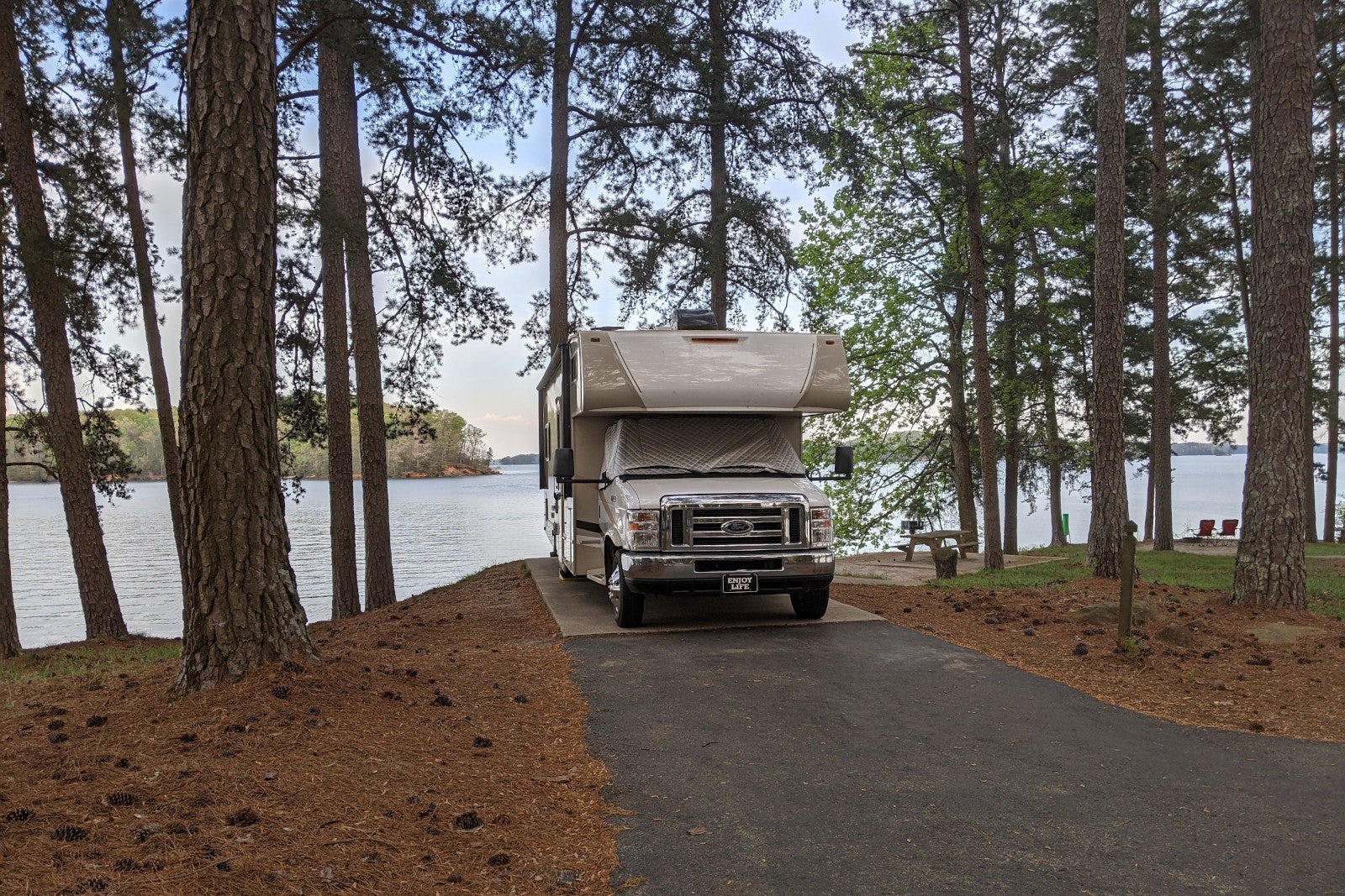RV in a campground by a lake