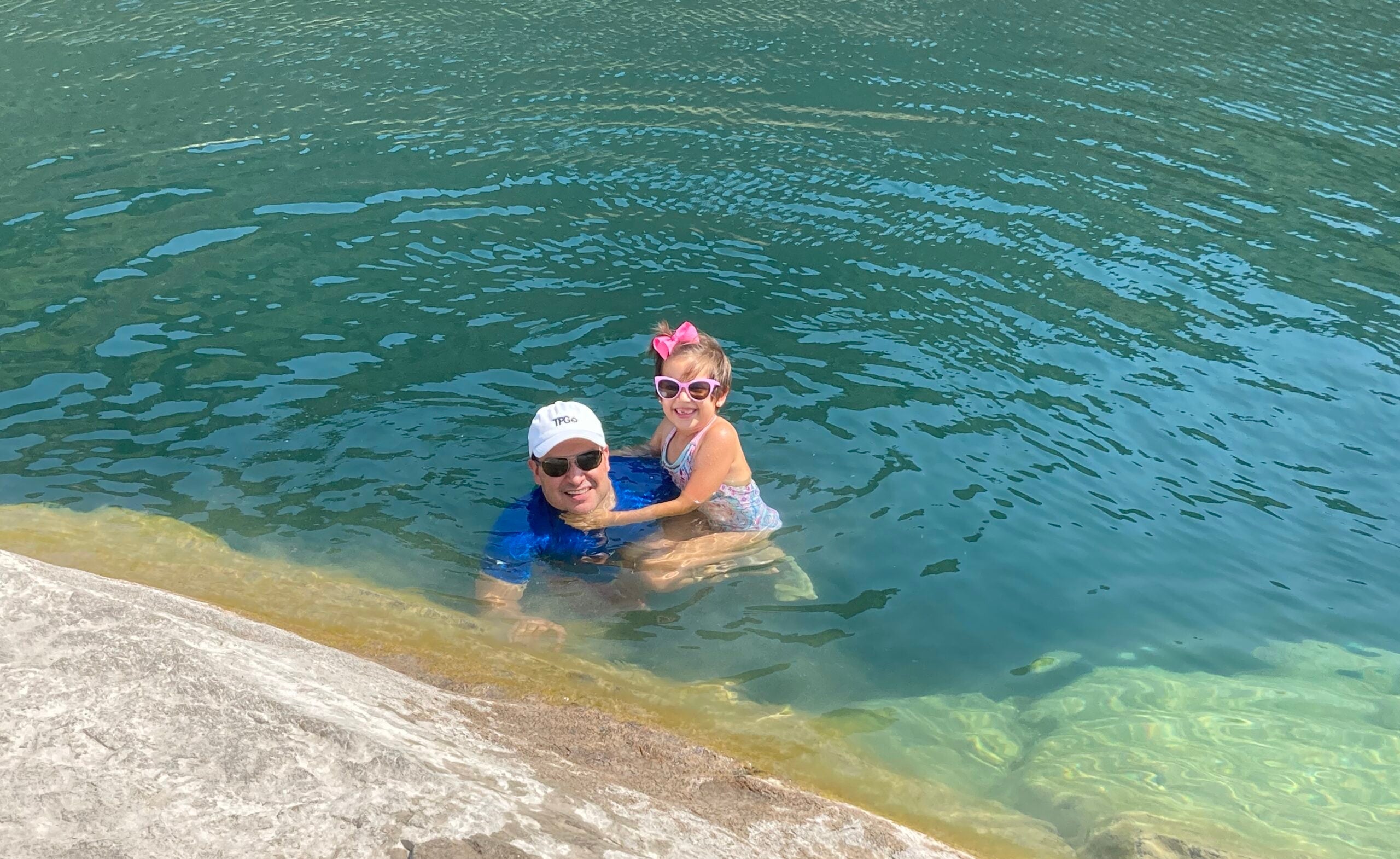 TPG editor Nick Ewen and his daughter in a natural pool in Twin Falls, Idaho